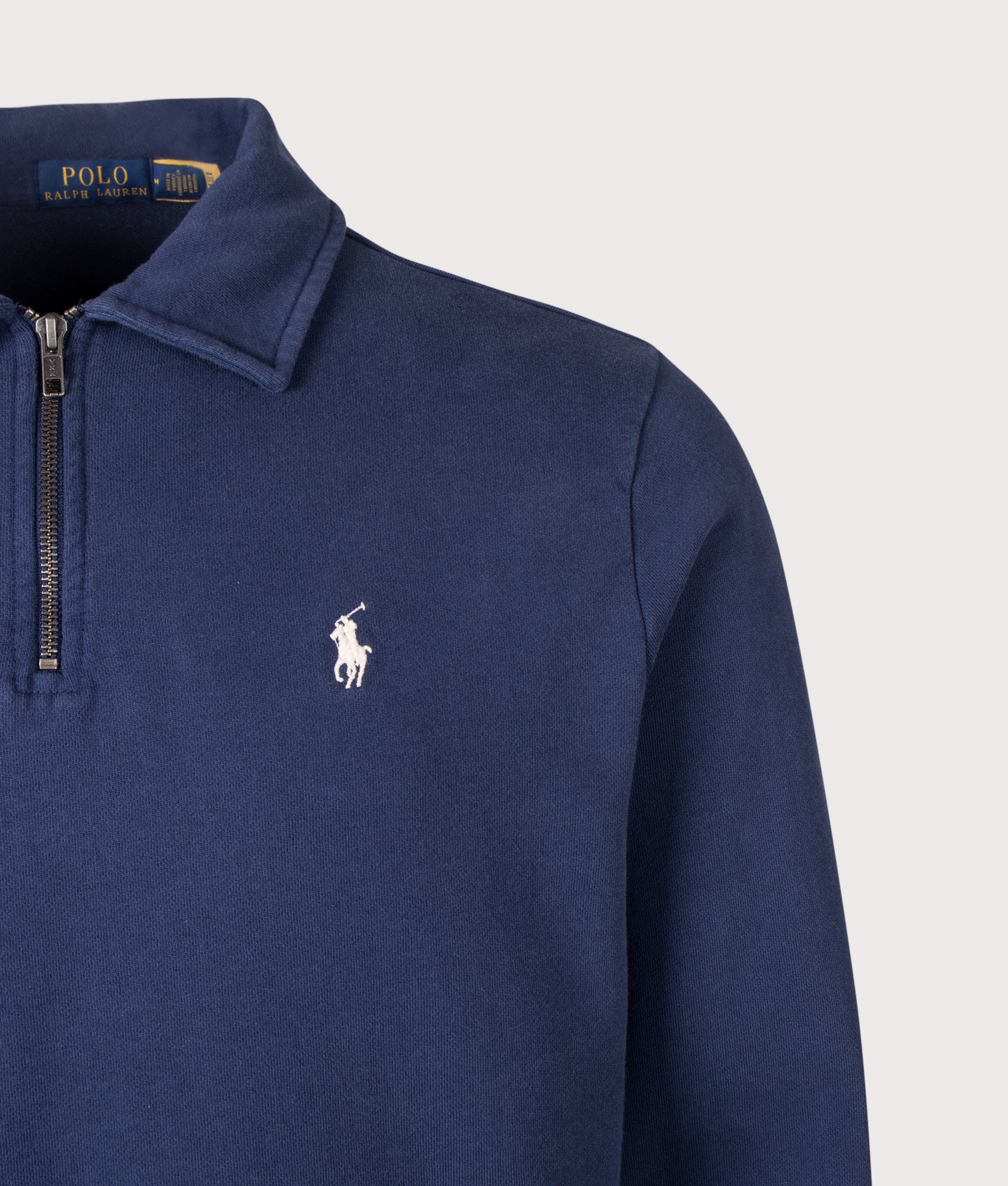 Polo Ralph Lauren Loopback Quarter Zip Sweatshirt in Cruise Navy at EQVVS Menswear. Detail shot.