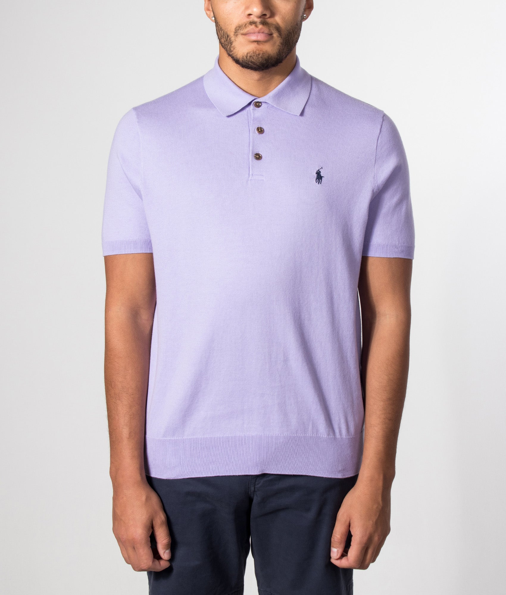 Polo Ralph Lauren Knitted Cotton Polo Shirt in Powder Purple at EQVVS Menswear. Model front shot.