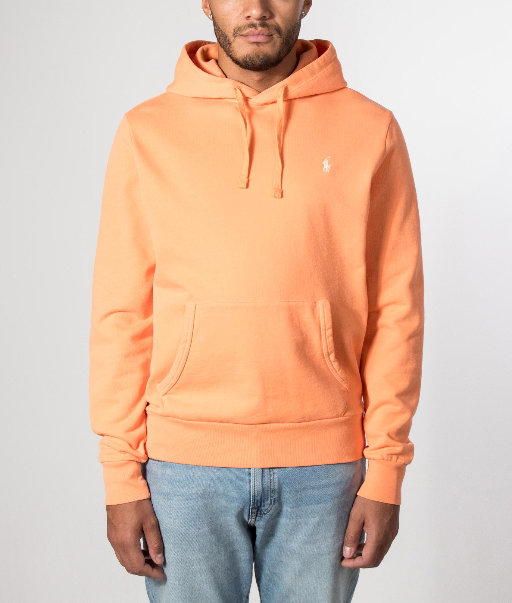 Polo Ralph Lauren Loopback Fleece Hoodie in Pompano Orange at EQVVS Menswear. Model front shot.