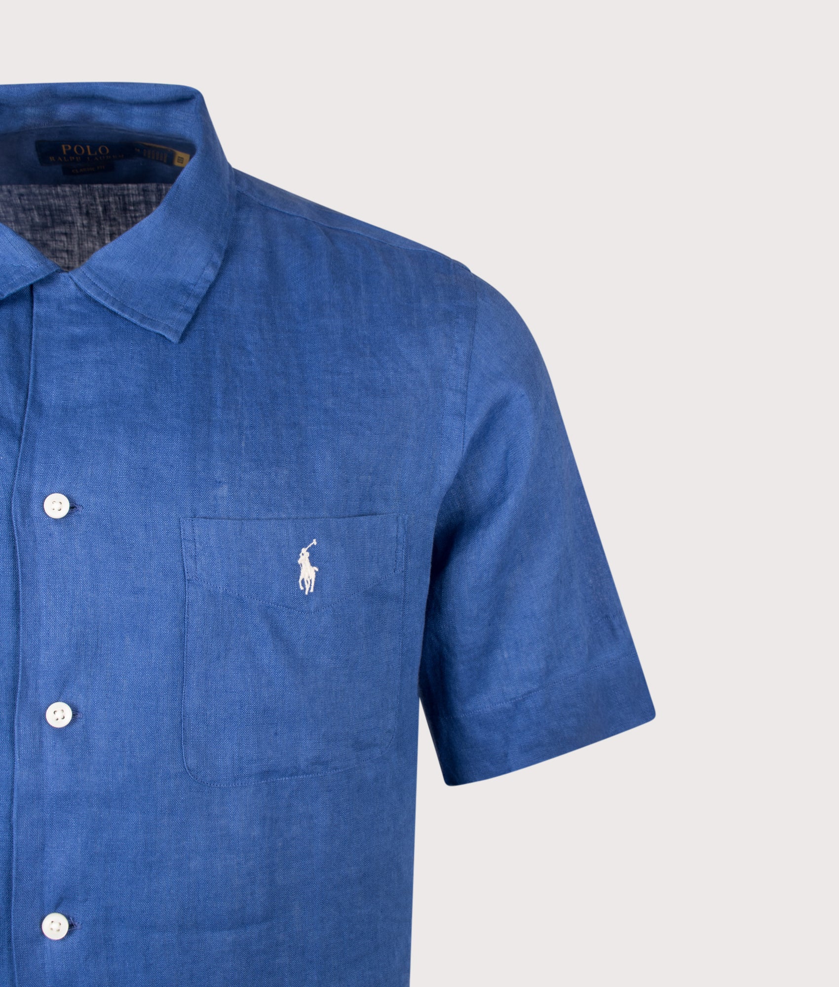 Polo Ralph Lauren Classic Fit Short Sleeve Linen Camp Shirt in Dusty Azure at EQVVS Menswear. Detail shot.