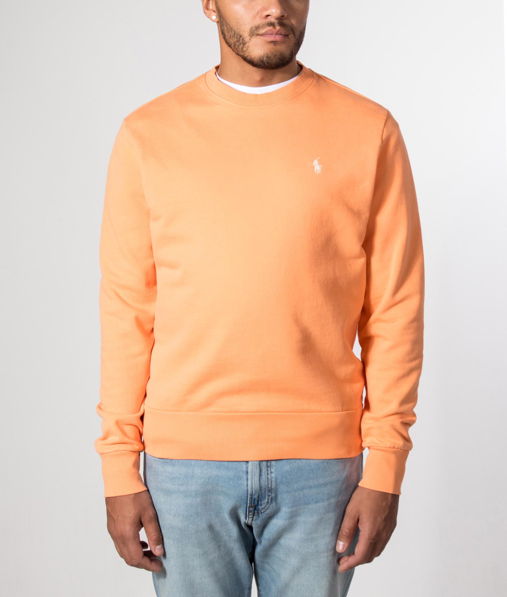 Polo Ralph Lauren Loopback Terry Sweatshirt in Pompano Orange at EQVVS Menswear. Model front shot.