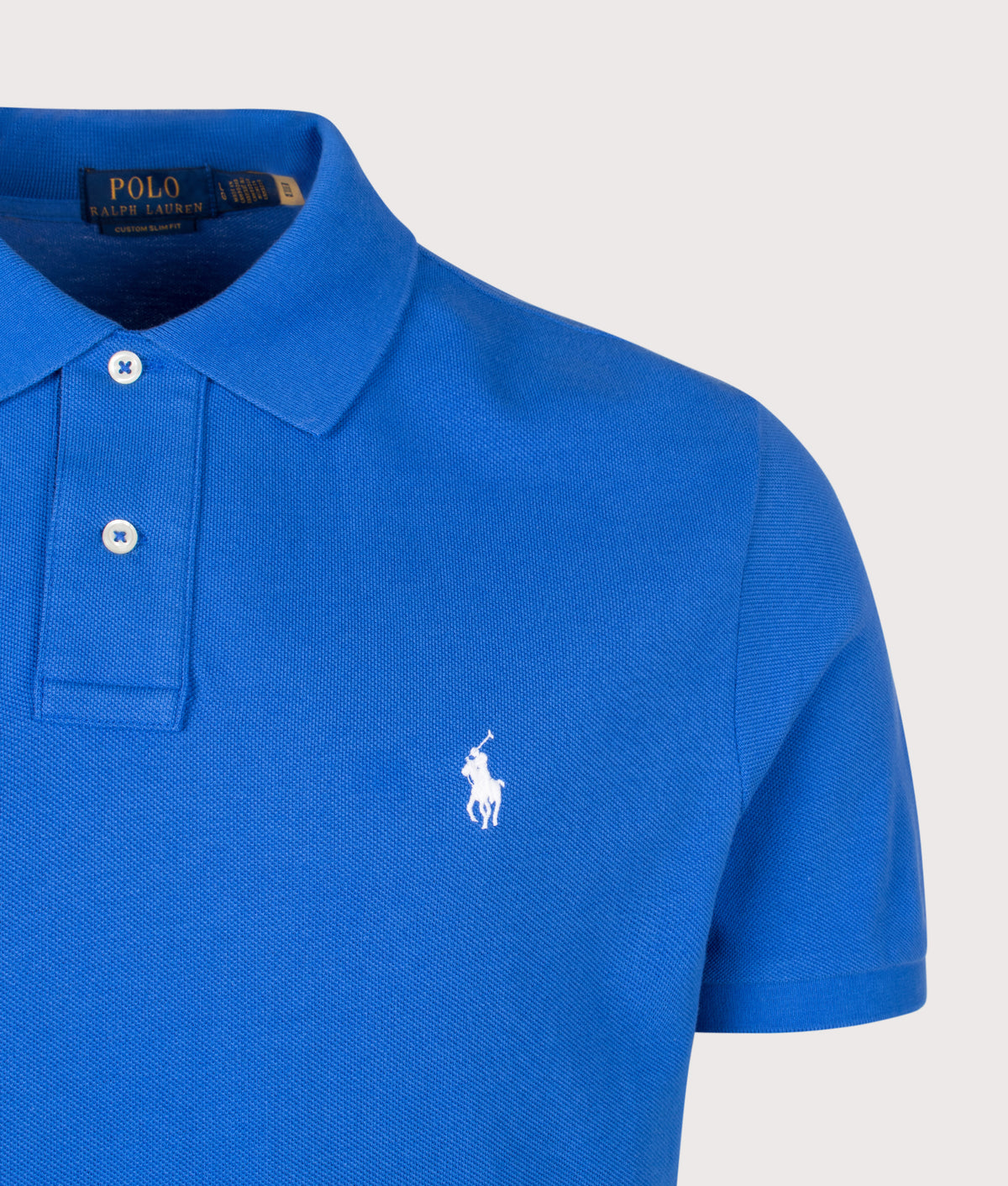 Polo Ralph Lauren Custom Slim Fit Mesh Polo Shirt in New Iris Blue at EQVVS Menswear. Detail shot.