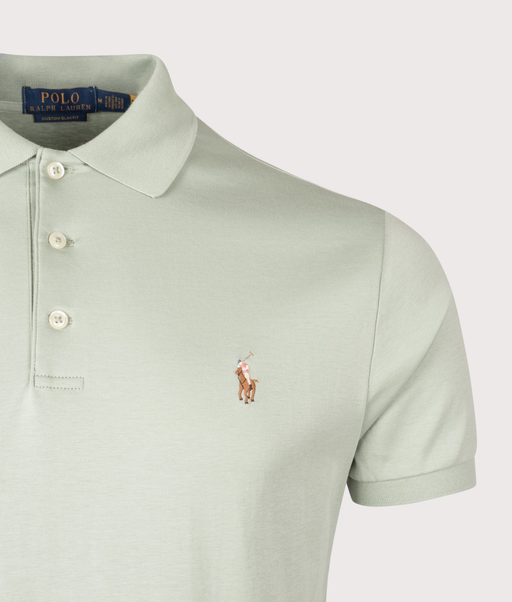 Polo Ralph Lauren Custom Slim Fit Soft Cotton Polo Shirt in Light Green at EQVVS Menswear. Detail shot.