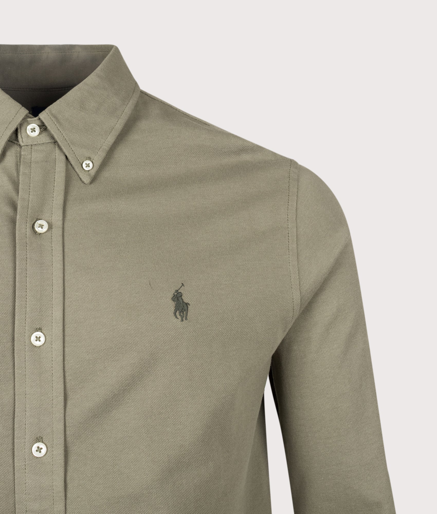 Polo Ralph Lauren Relaxed Fit Featherweight Mesh Shirt in Cruise Olive at EQVVS Menswear. Detail shot.