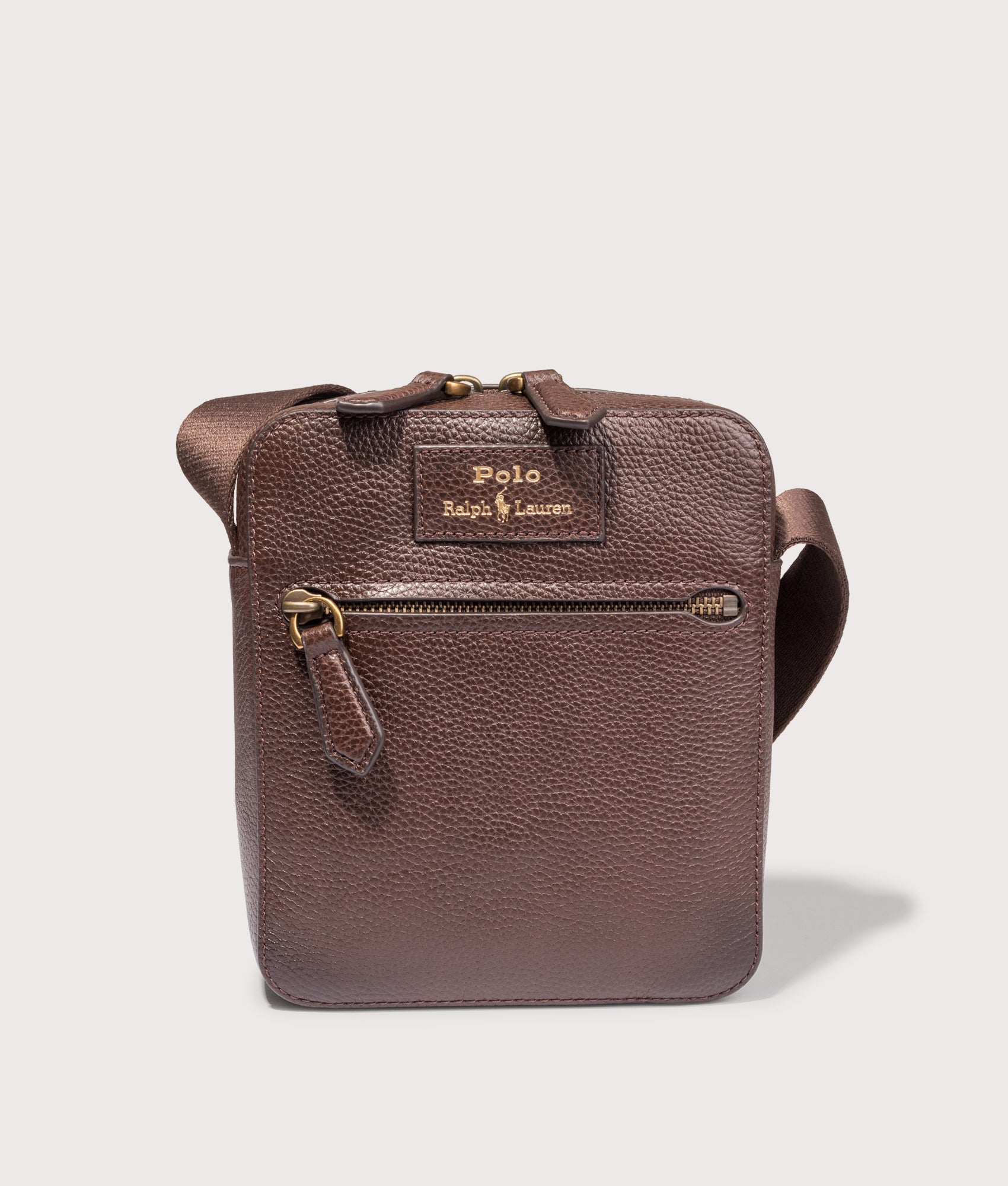 Polo Ralph Lauren Pebbled Leather Crossbody Bag in Dark Brown at EQVVS Menswear. Front shot.