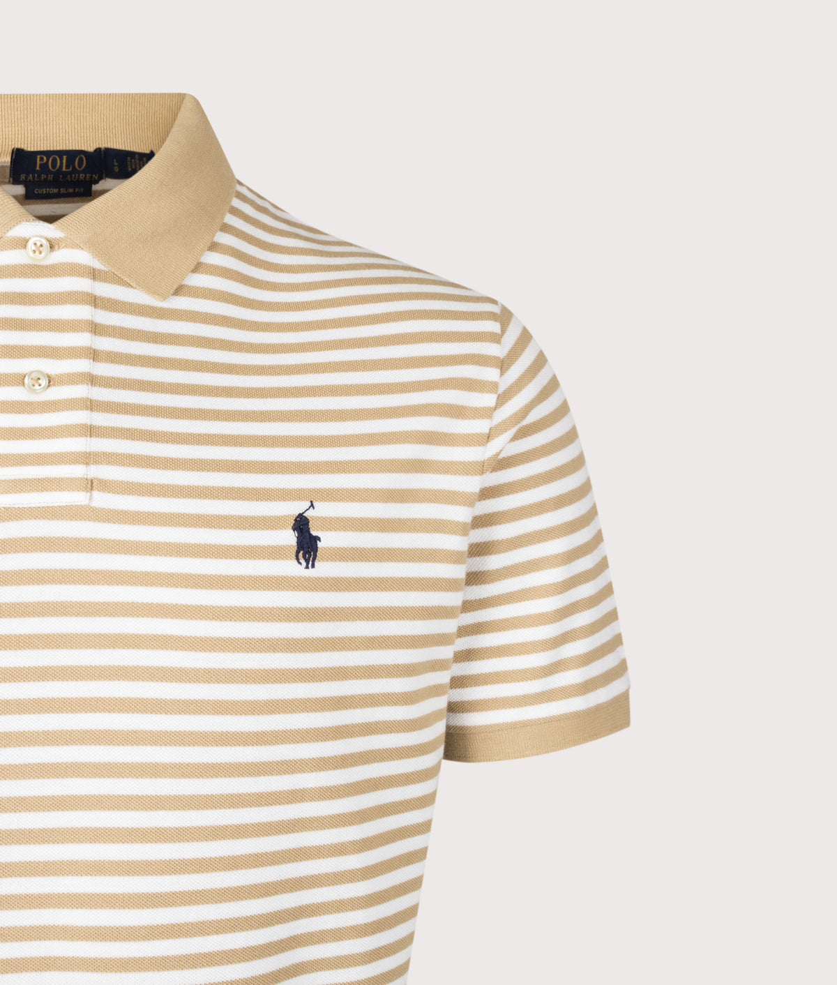 Polo Ralph Lauren Custom Slim Fit Striped Mesh Polo Shirt in Vintage Khaki and White at EQVVS Menswear. Detail shot.