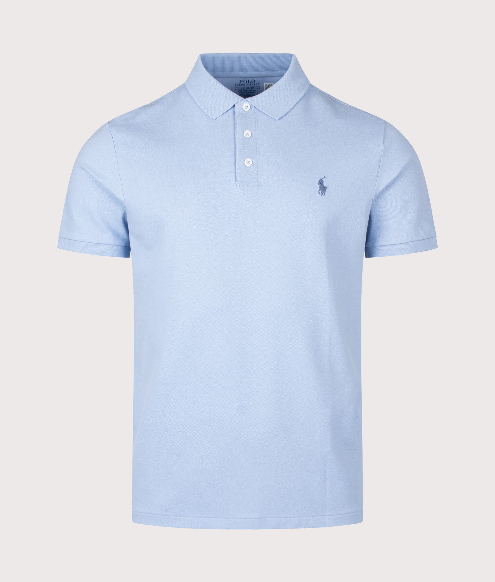 Polo Ralph Lauren Custom Slim Fit Stretch Mesh Polo Shirt in Chambray Blue at EQVVS Menswear. Front shot.