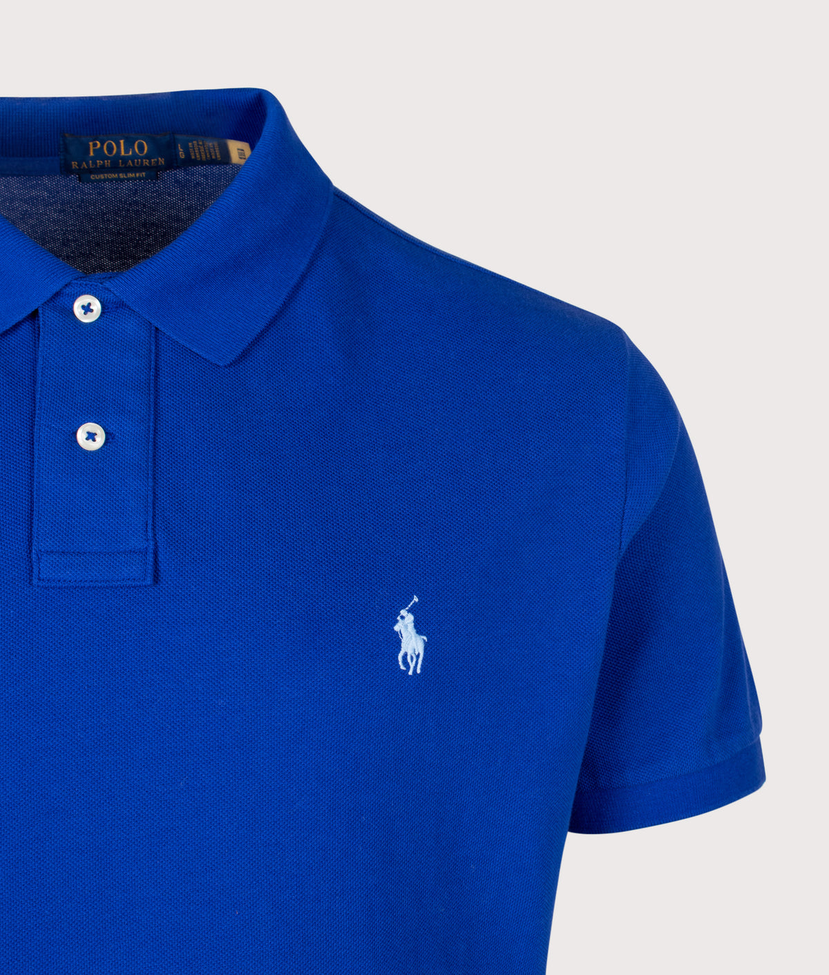 Polo Ralph Lauren Custom Slim Fit Mesh Polo Shirt in Classic Azure at EQVVS Menswear. Detail shot.