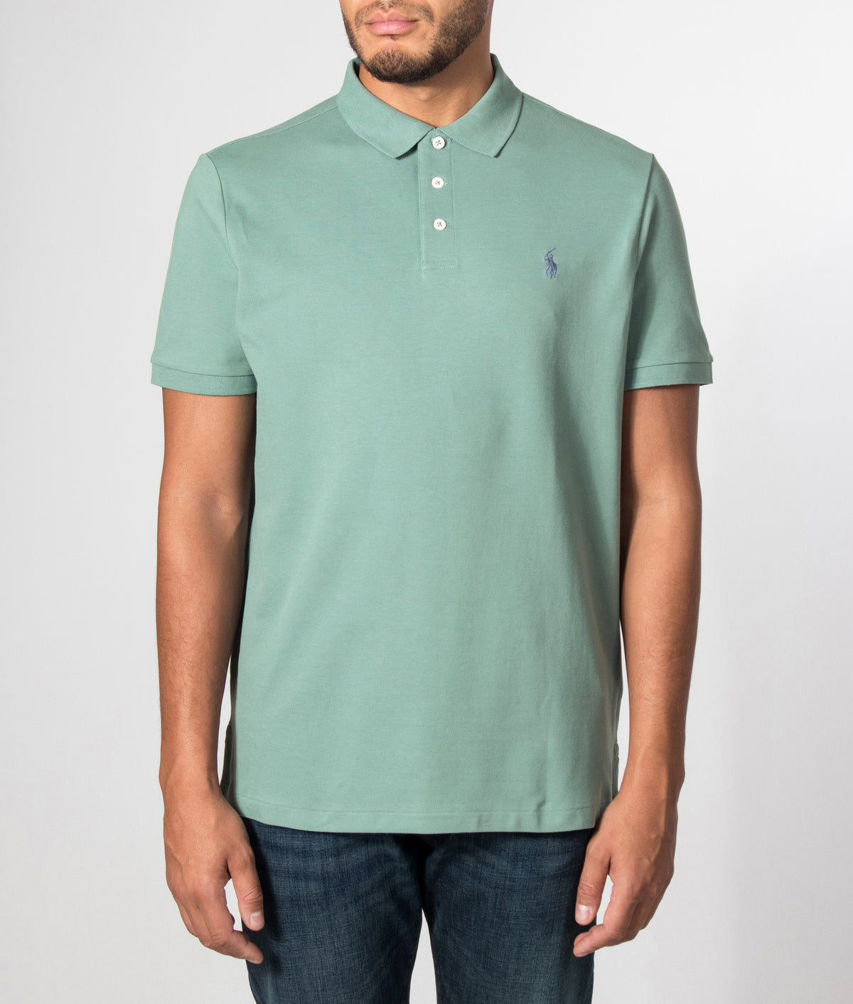 Polo Ralph Lauren Custom Slim Fit Stretch Mesh Polo Shirt in Greenscape at EQVVS Menswear. Model front shot.