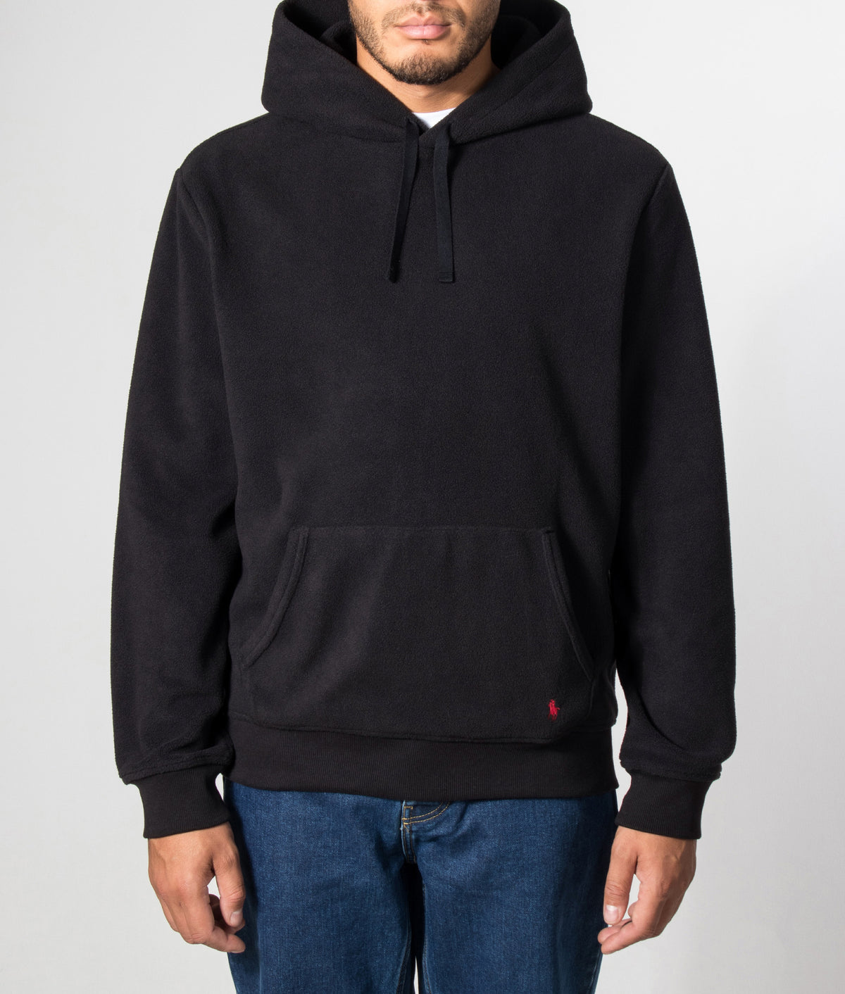 Polo Ralph Lauren Regular Fit Polar Fleece Hoodie in Polo Black at EQVVS Menswear. Model front shot.
