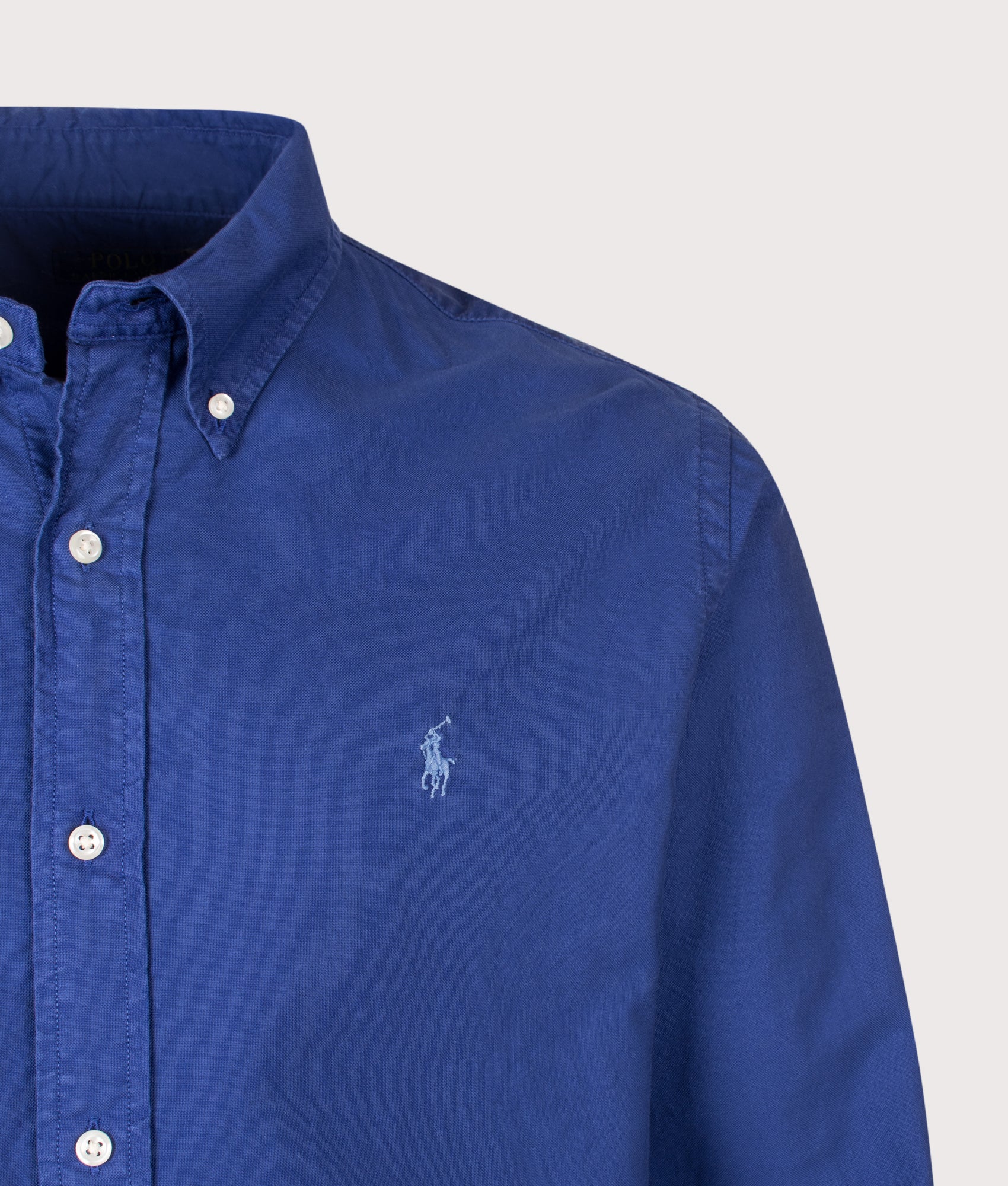Polo Ralph Lauren Custom Fit Garment-Dyed Oxford Shirt in Blue Yatch at EQVVS Menswear. Detail shot.