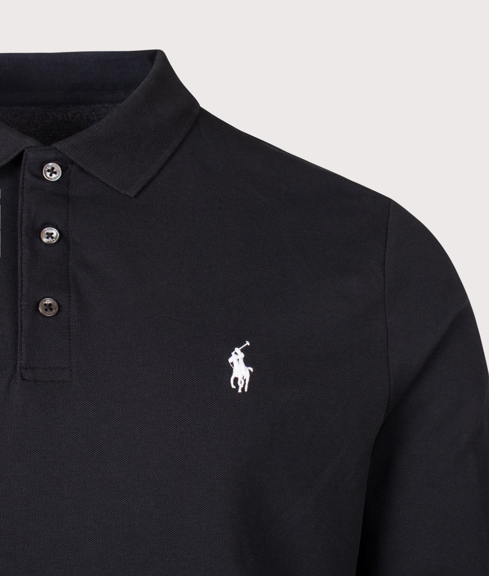 Polo Ralph Lauren Custom Slim Fit Stretch Mesh Long Sleeve Polo Shirt in Polo Black at EQVVS Menswear. Detail shot.