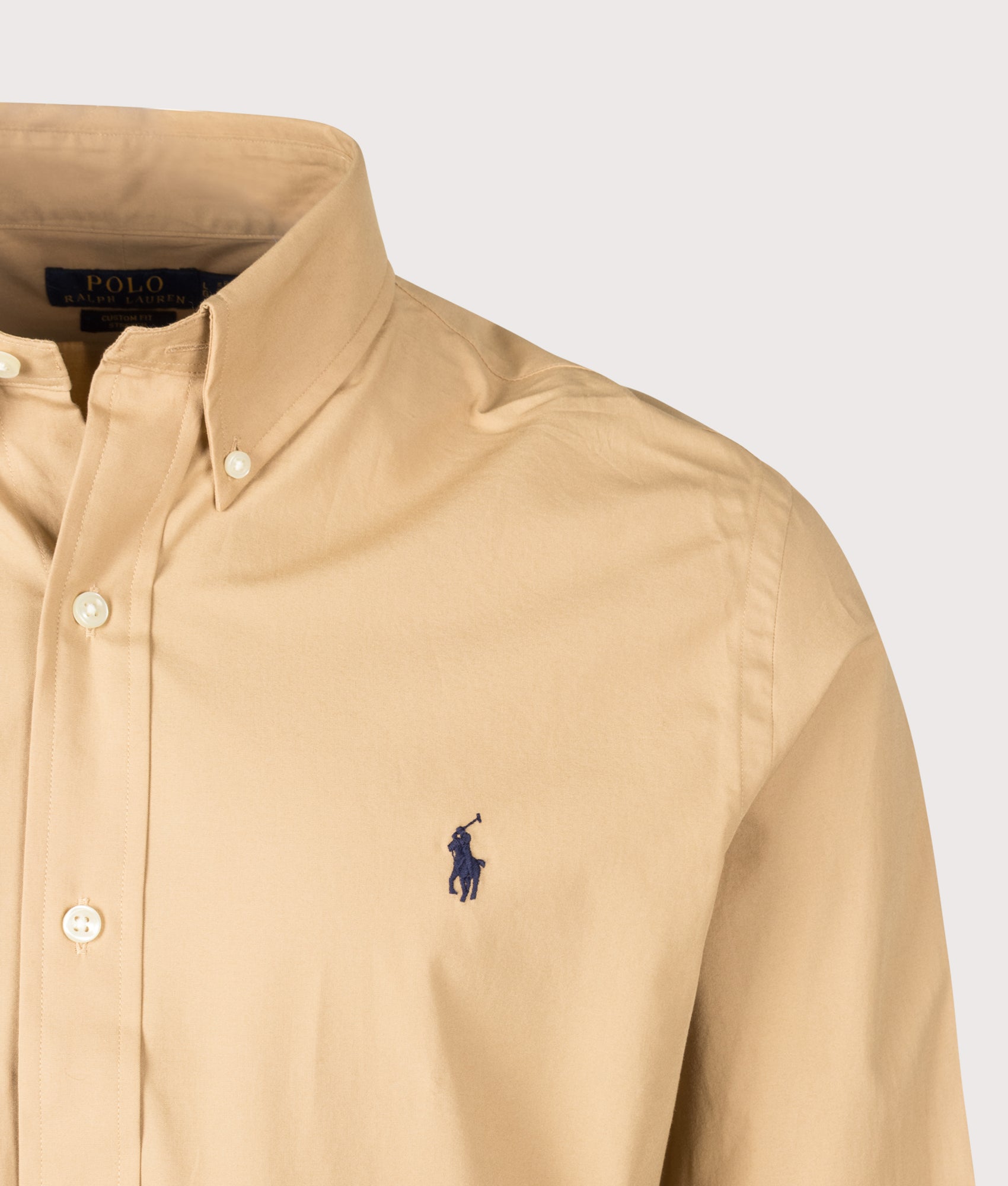 Polo Ralph Lauren Custom Fit Stretch Poplin Shirt in Classic Camel at EQVVS Menswear. Detail shot.