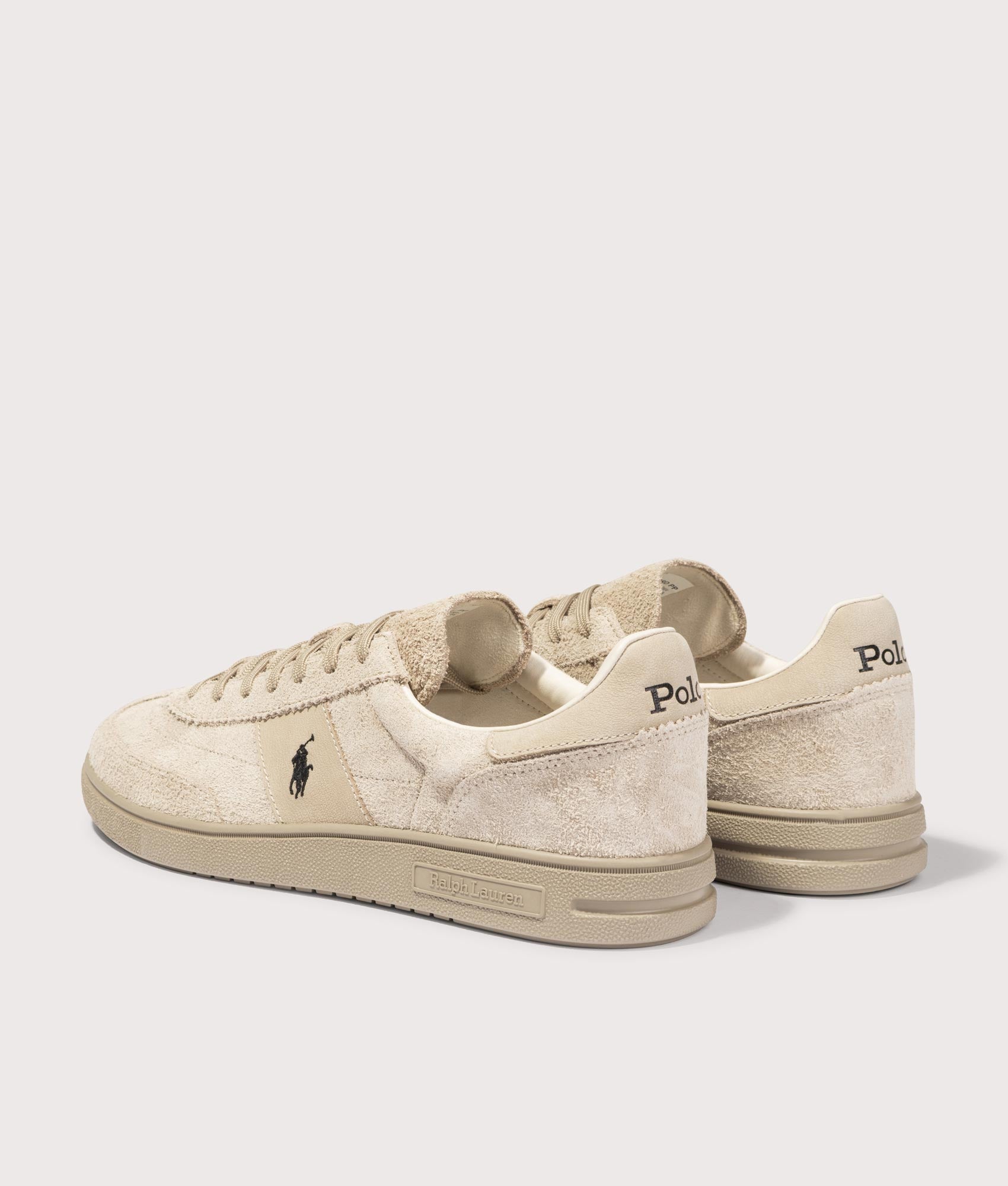 Polo Ralph Lauren Bedford Suede Sneakers in Tonal Milkshake at EQVVS Menswear. Angled back shot.