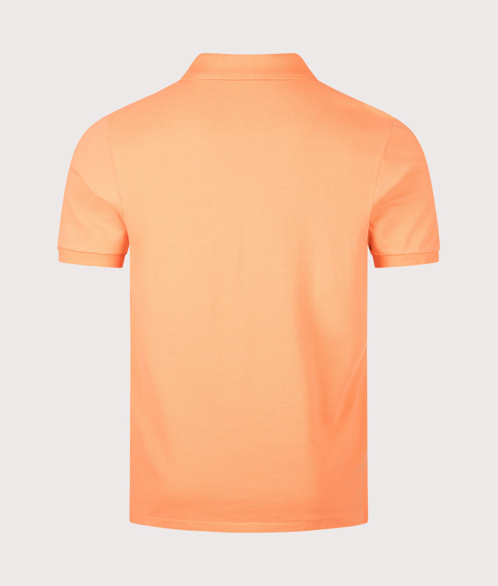 Custom Slim Fit Mesh Polo Shirt in Orange by Polo Ralph Lauren. Shot by EQVVS. Back shot.