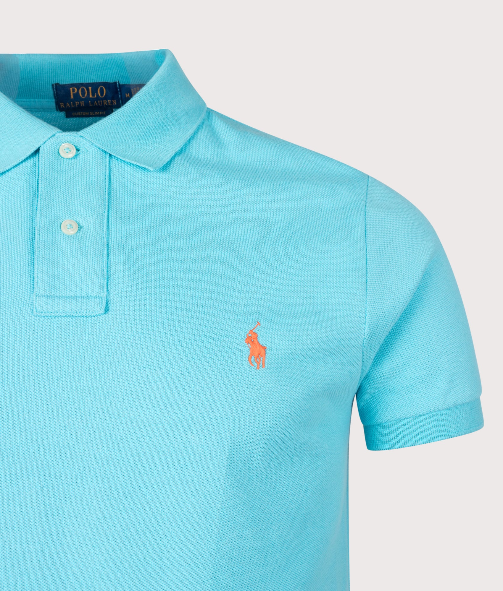 Polo Ralph Lauren Custom Slim Fit Mesh Polo Shirt in Perfect Turquoise at EQVVS Menswear. Detail shot.