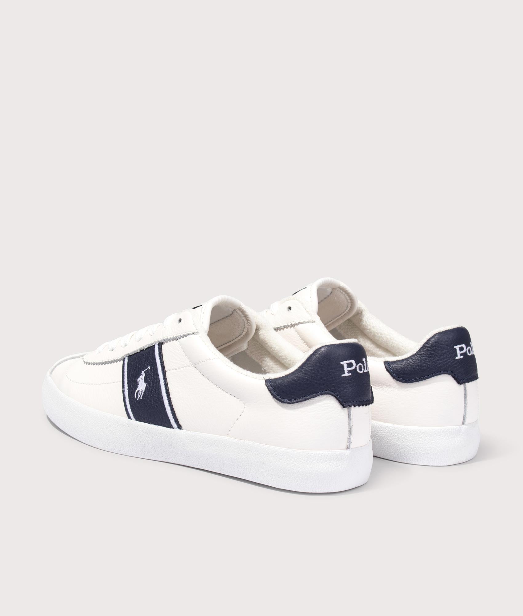 Polo Ralph Lauren Court Vulcanised Leather Sneakers in Deckwash White and Navy at EQVVS Menswear. Angled back shot.