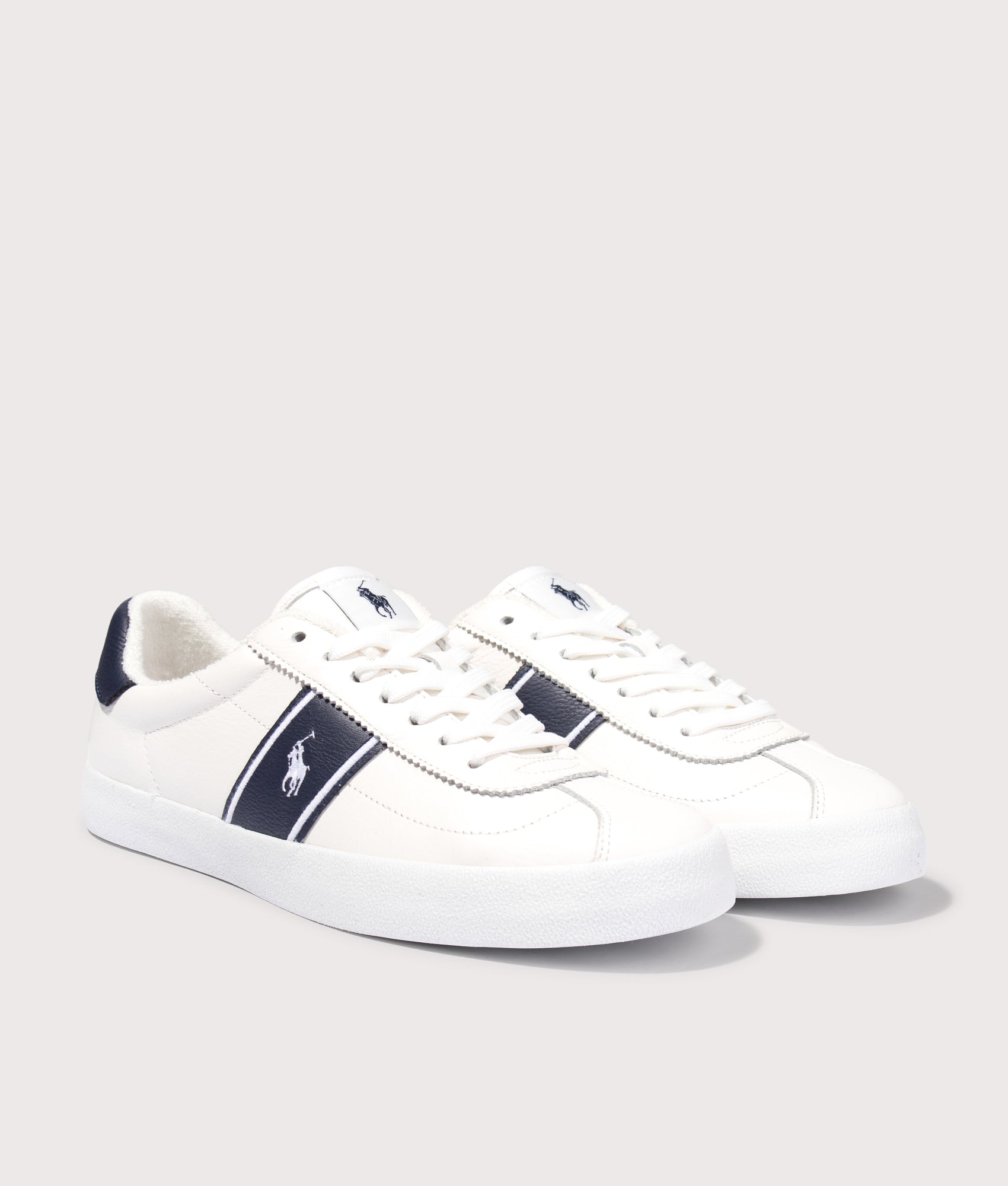 Polo Ralph Lauren Court Vulcanised Leather Sneakers in Deckwash White and Navy at EQVVS Menswear. Angled front shot.