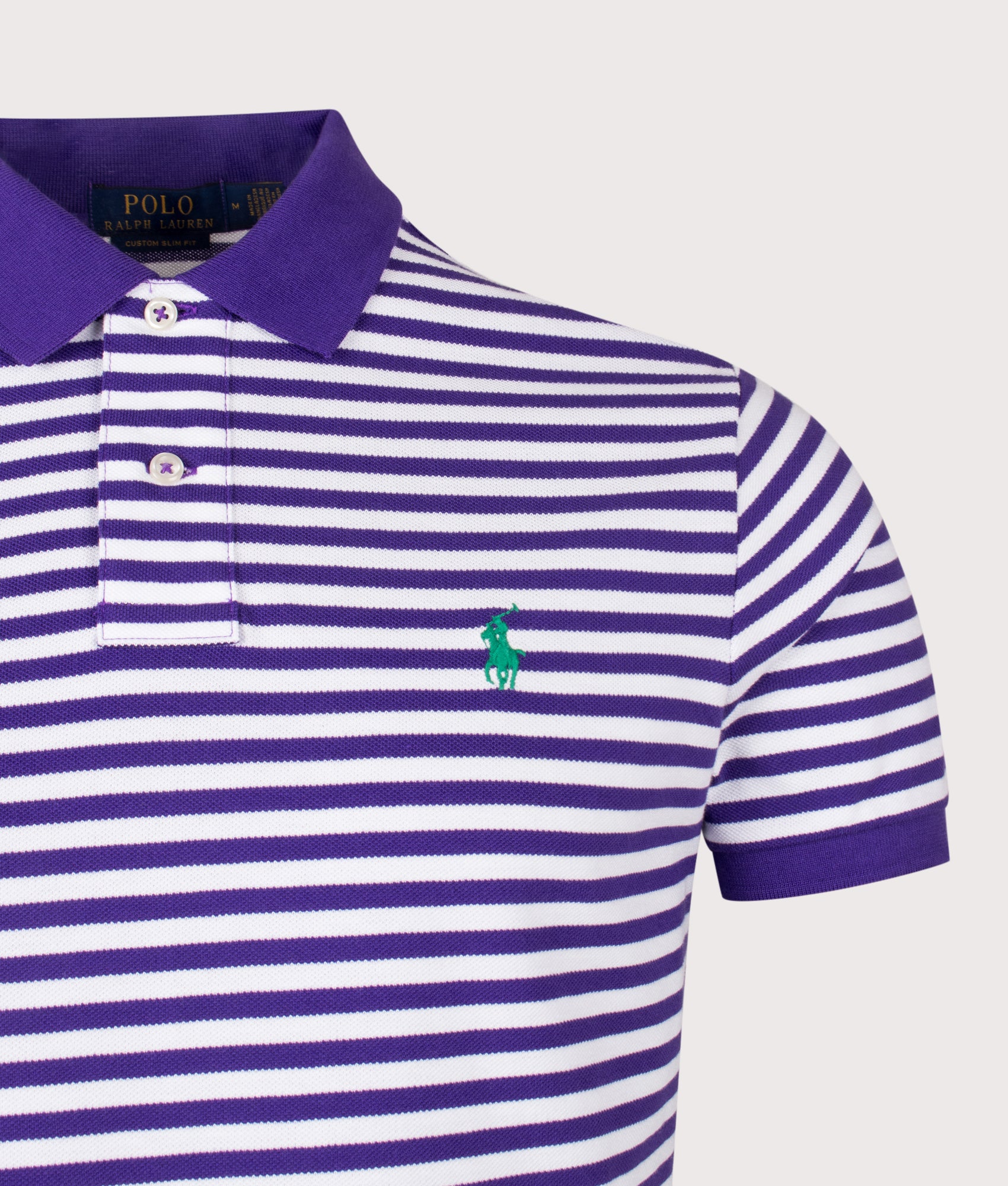 Polo Ralph Lauren Custom Slim Fit Striped Mesh Polo Shirt in Cabana Purple and White Stripe at EQVVS Menswear. Detail shot.