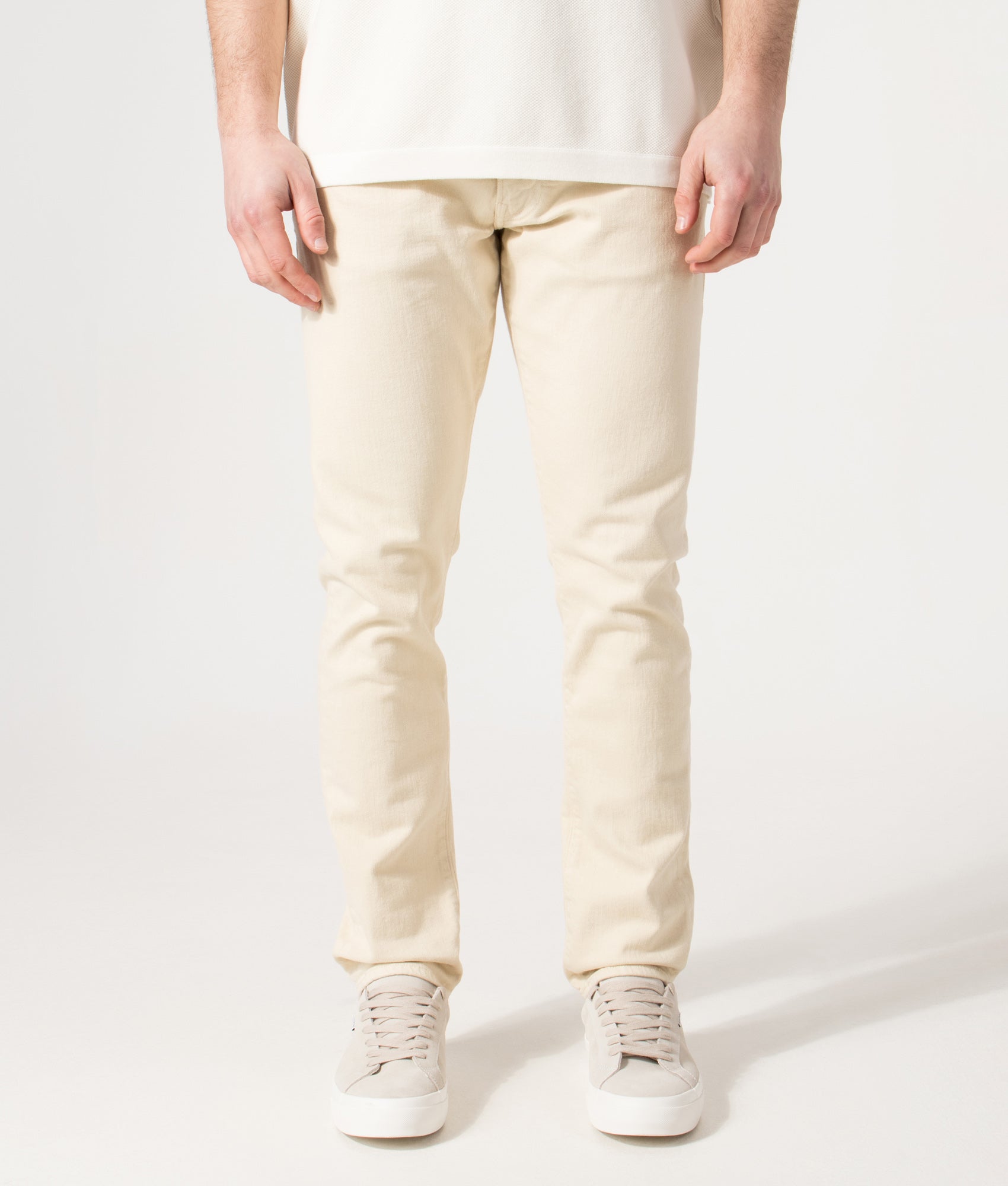 Polo Ralph Lauren Slim Fit Sullivan Stretch Jeans in Andover Cream at EQVVS Menswear. Model front shot.