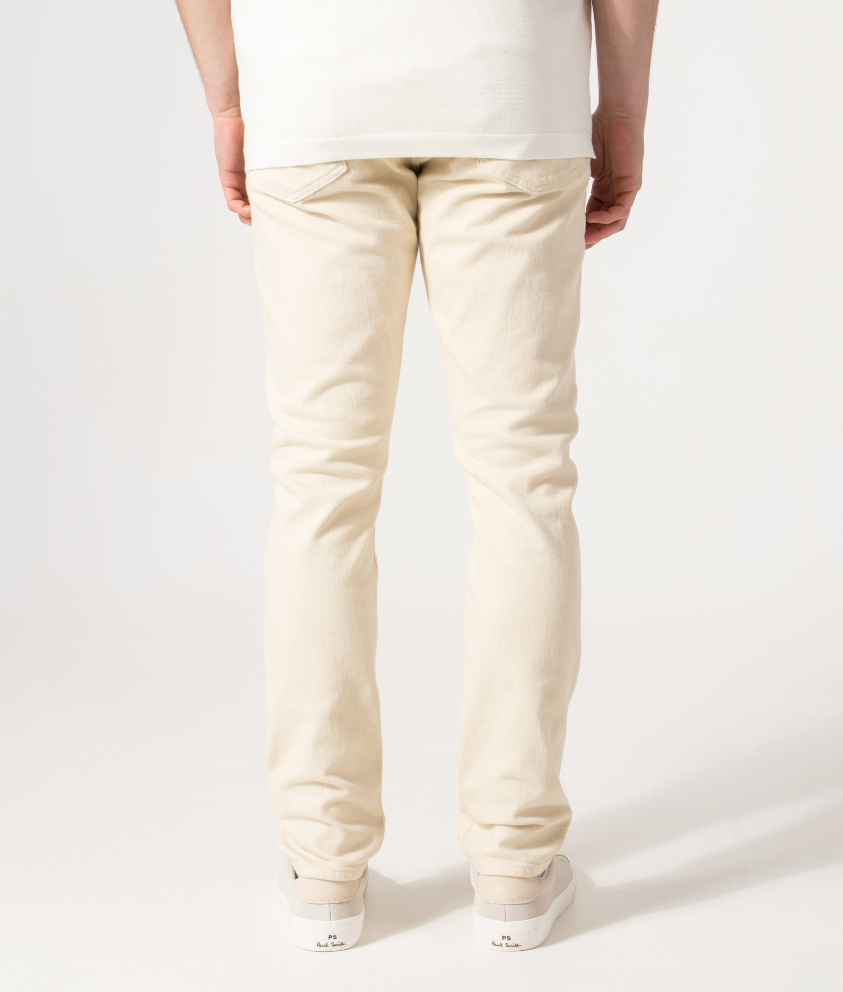 Polo Ralph Lauren Slim Fit Sullivan Stretch Jeans in Andover Cream at EQVVS Menswear. Model back shot.