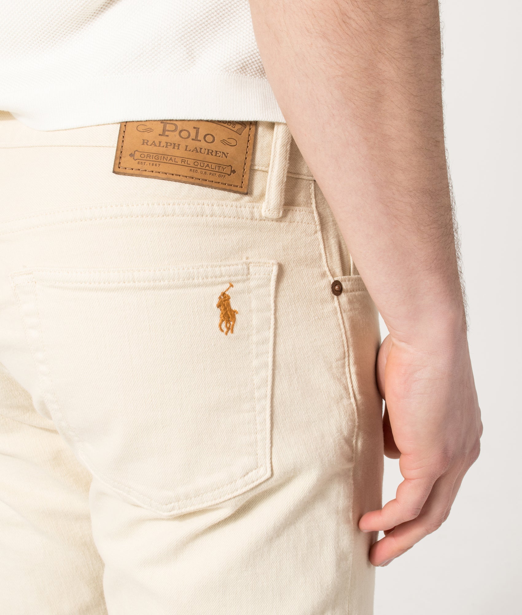 Polo Ralph Lauren Slim Fit Sullivan Stretch Jeans in Andover Cream at EQVVS Menswear. Back detail shot.