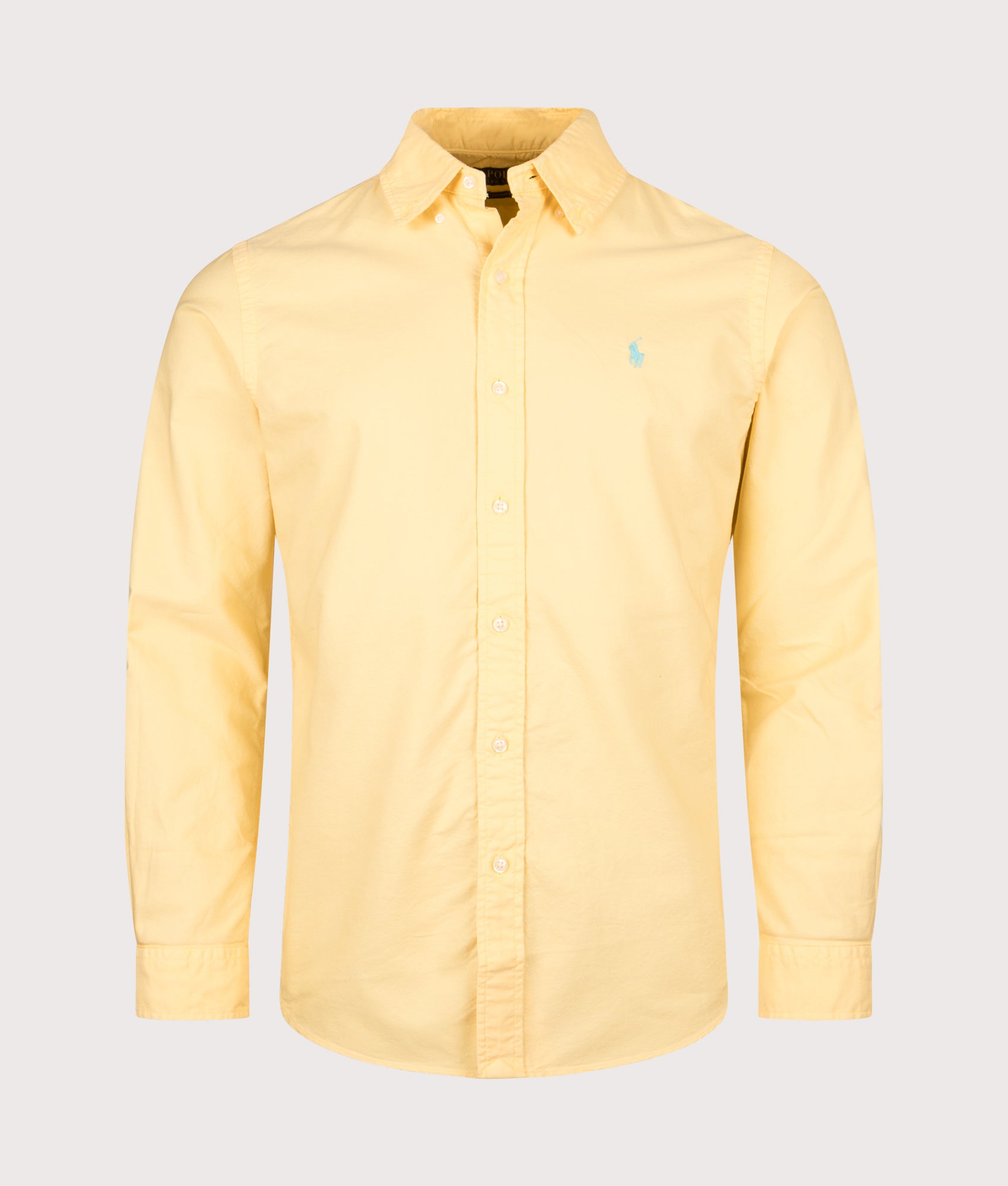 Polo Ralph Lauren Custom Fit Garment-Dyed Oxford Shirt in Corn Yellow at EQVVS Menswear. Front shot.