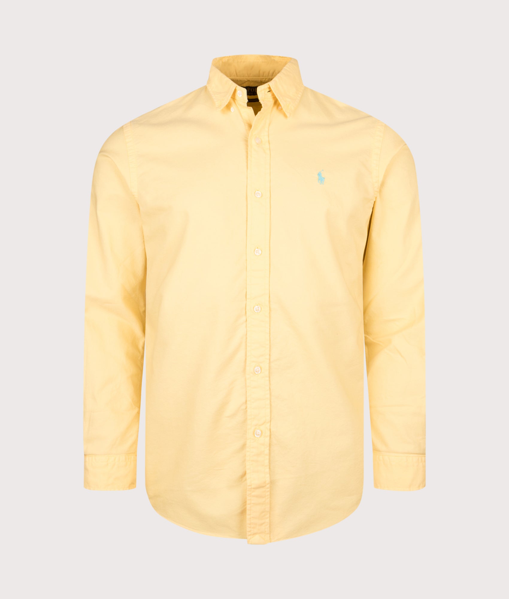 Polo Ralph Lauren Custom Fit Garment-Dyed Oxford Shirt in Corn Yellow at EQVVS Menswear. Front shot.
