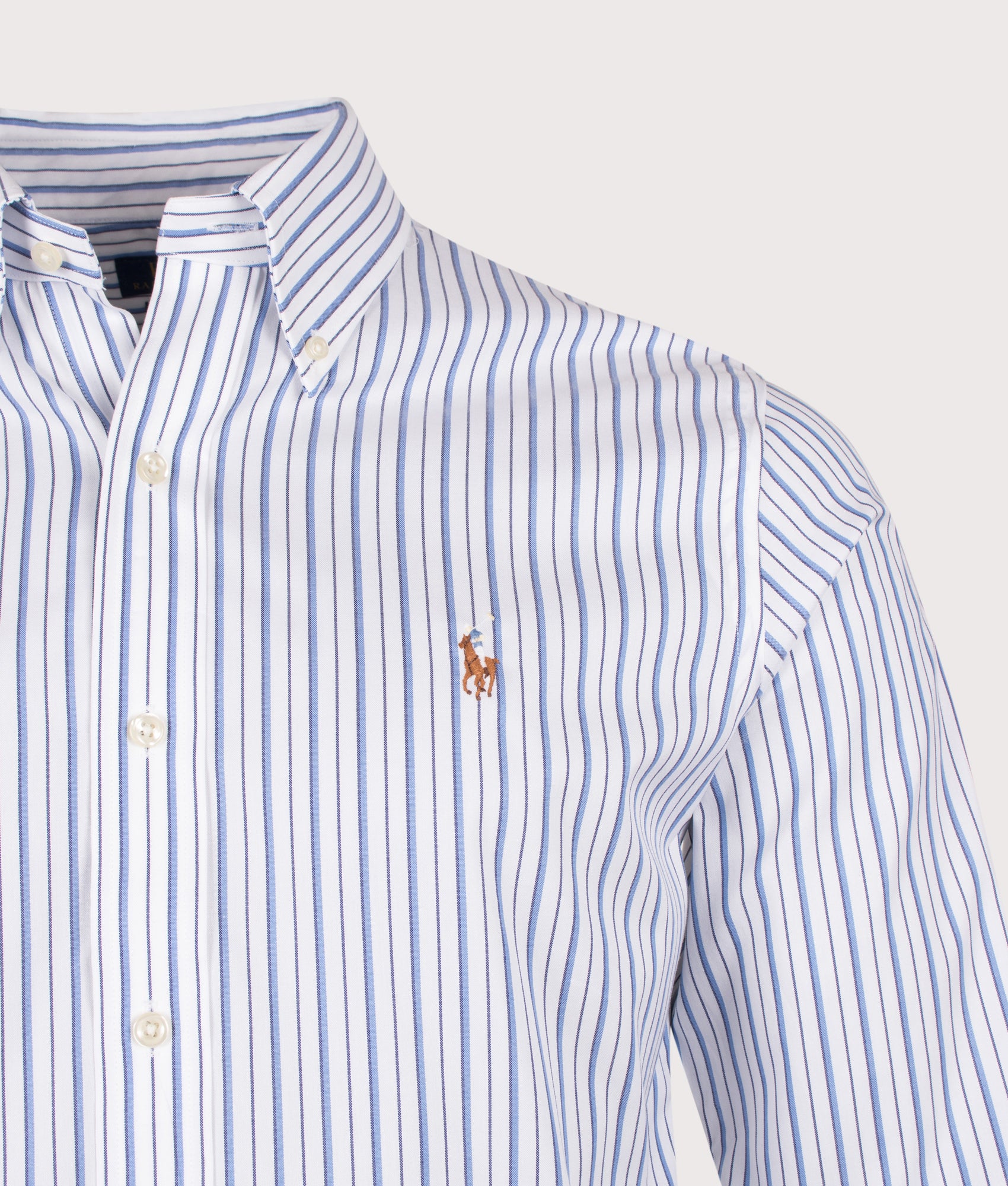 Polo Ralph Lauren Custom Fit Striped Pinpoint Oxford Shirt in White and Sky Blue stripe at EQVVS Menswear. Detail shot.