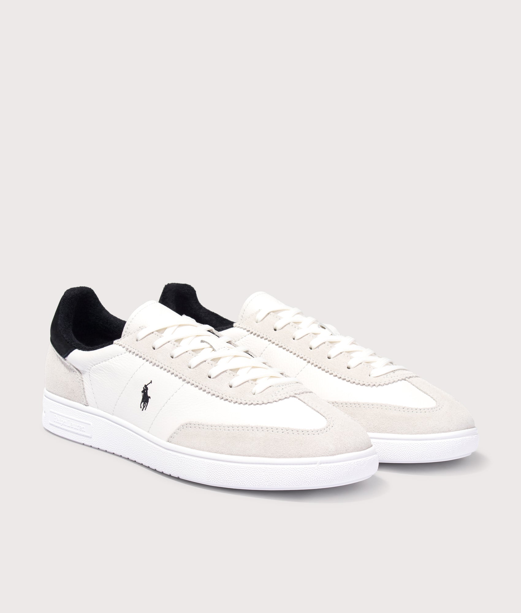 Polo Ralph Lauren Bedford Leather-Suede Sneakers in Deckwash White and Black at EQVVS Menswear. Angled front shot.
