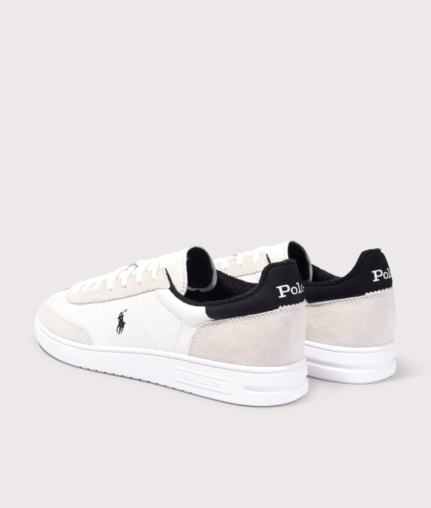 Polo Ralph Lauren Bedford Leather-Suede Sneakers in Deckwash White and Black at EQVVS Menswear. Angled back shot.