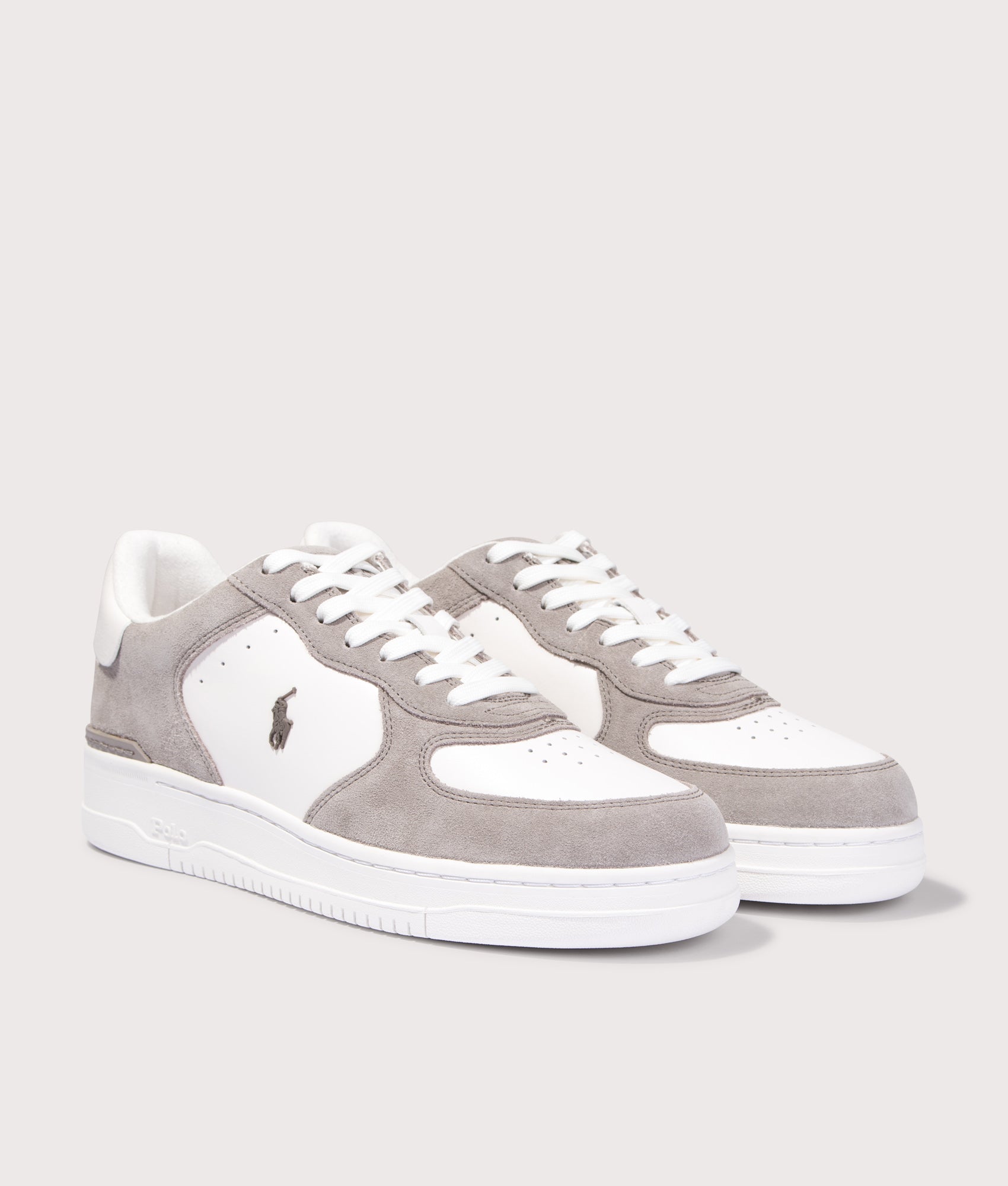 Polo Ralph Lauren Masters Low Top Court Sneakers in Earth Grey and Deckwash White at EQVVS Menswear. Angled front shot.