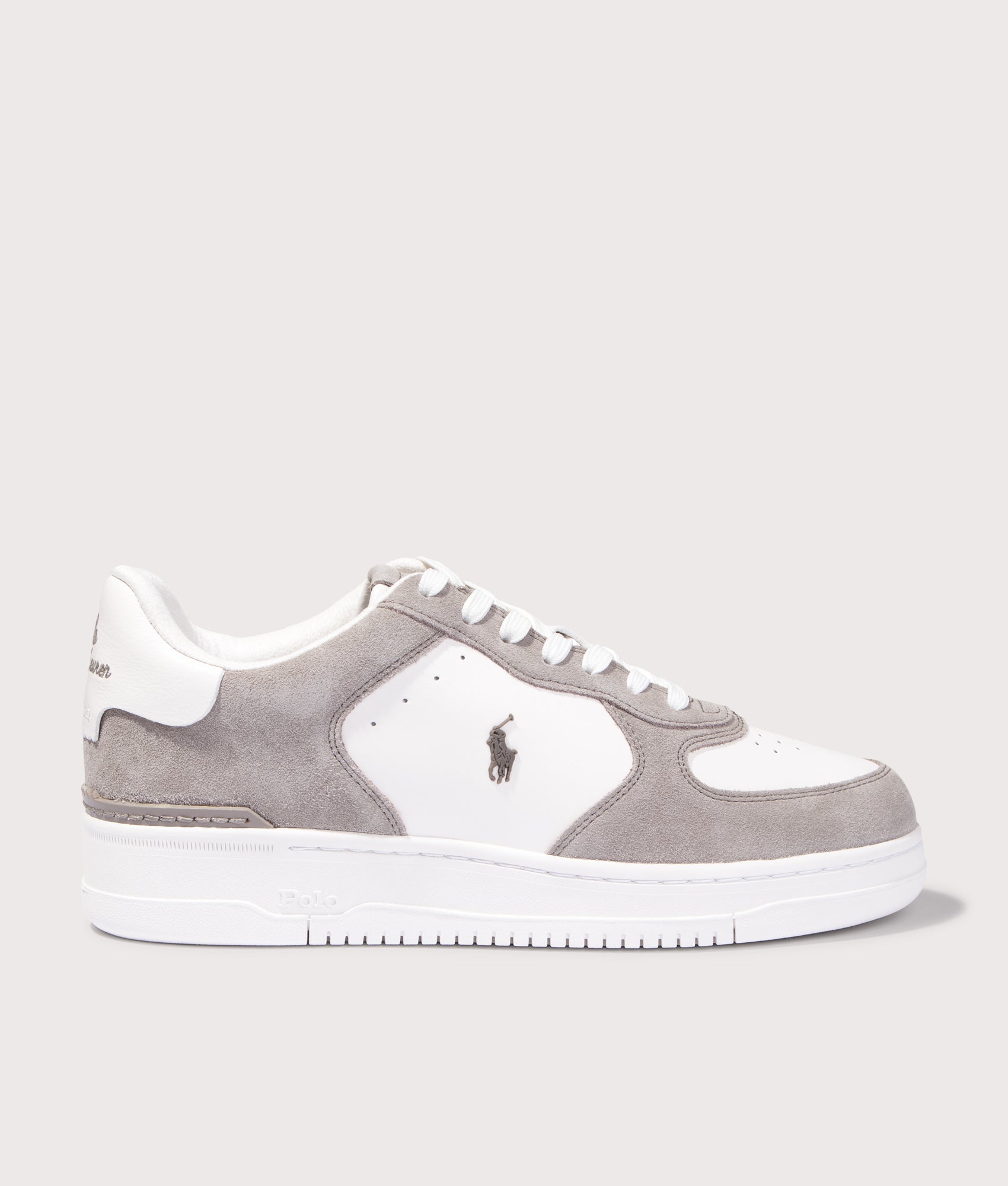 Polo Ralph Lauren Masters Low Top Court Sneakers in Earth Grey and Deckwash White at EQVVS Menswear. Side shot.