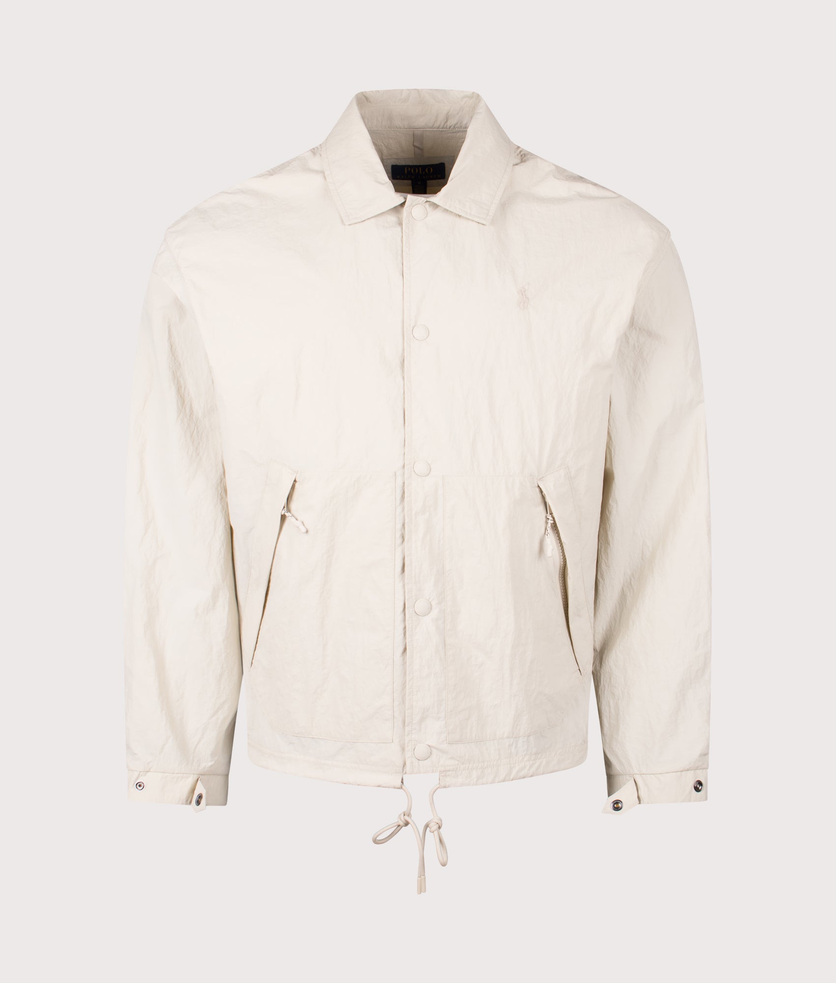 Polo Ralph Lauren The Hayford Coach's Windbreaker Jacket in Basic Sand at EQVVS Menswear. Front shot. 