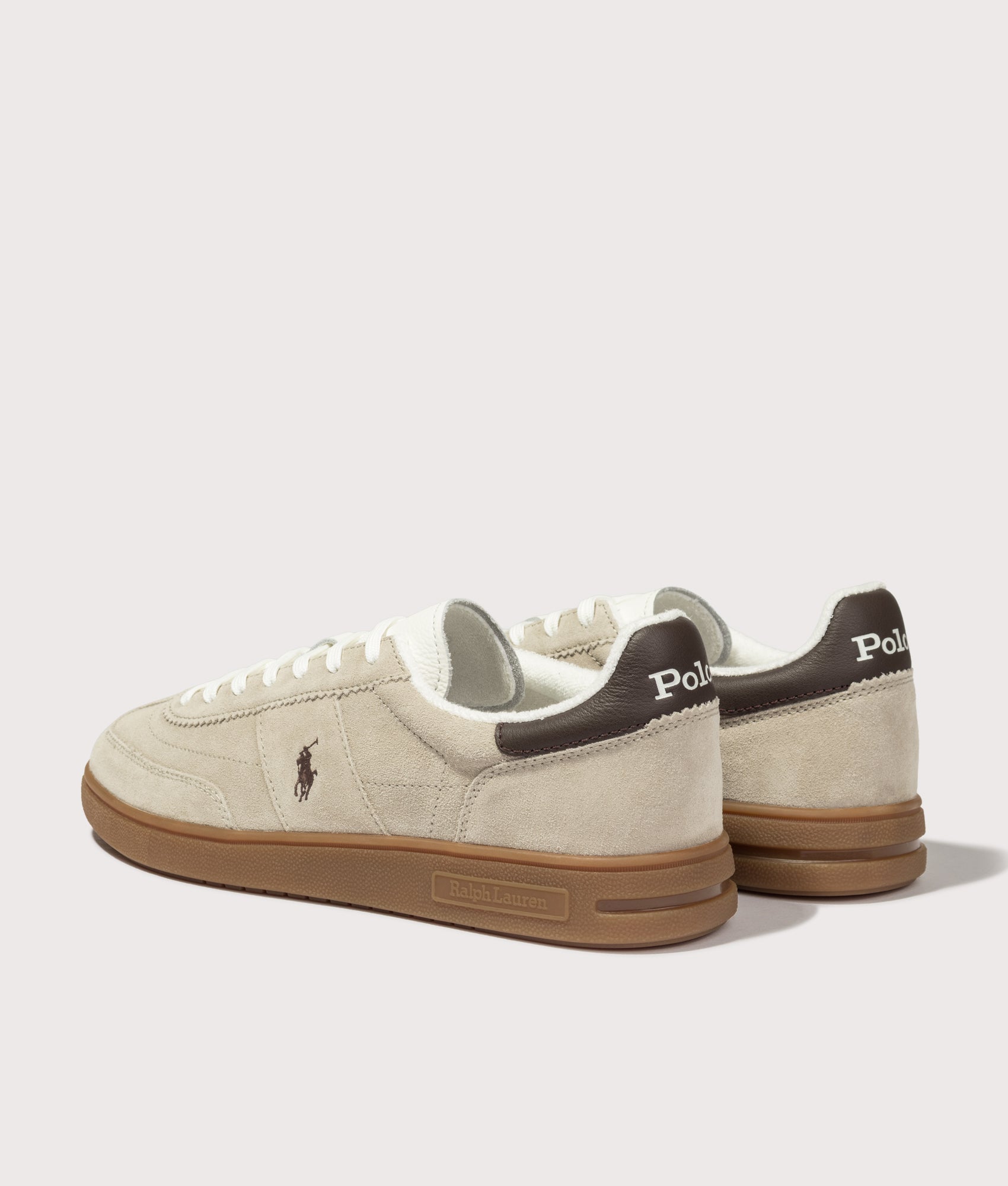 Polo Ralph Lauren Bedford Suede Sneakers in Milkshake and Dark Brown at EQVVS Menswear. Angled back shot.