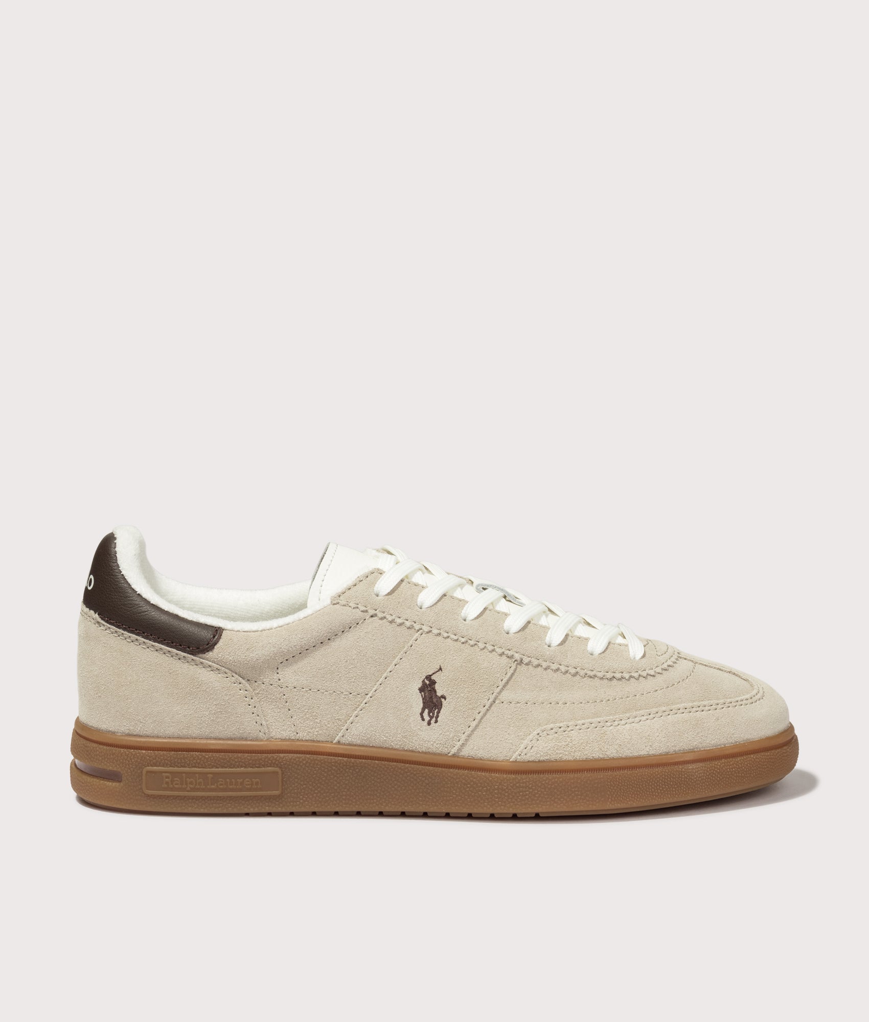 Polo Ralph Lauren Bedford Suede Sneakers in Milkshake and Dark Brown at EQVVS Menswear. Side detail shot.