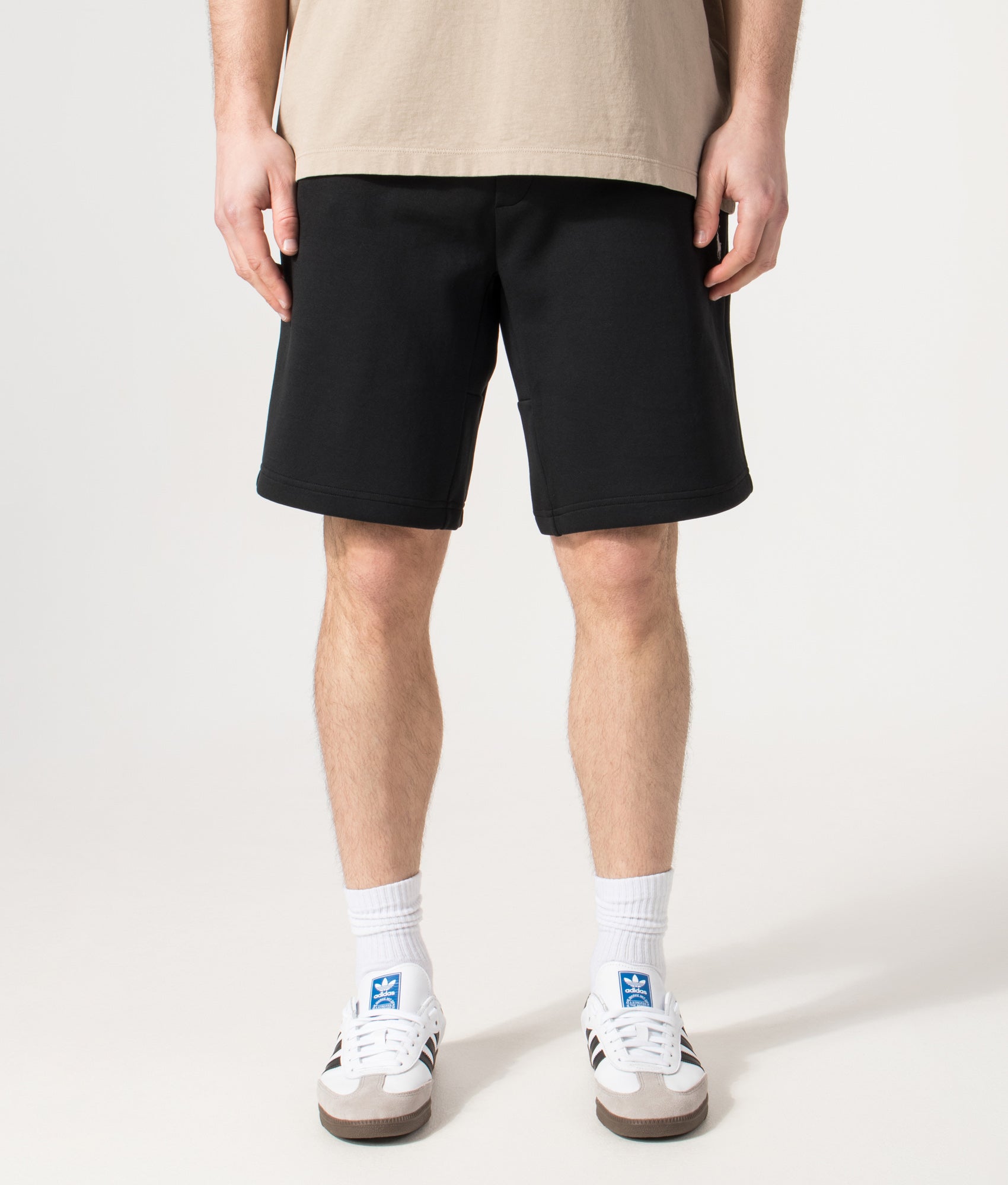 Polo Ralph Lauren Regular Fit Double Knit Athletic Sweat Shorts in Polo Black at EQVVS Menswear. Model front shot.