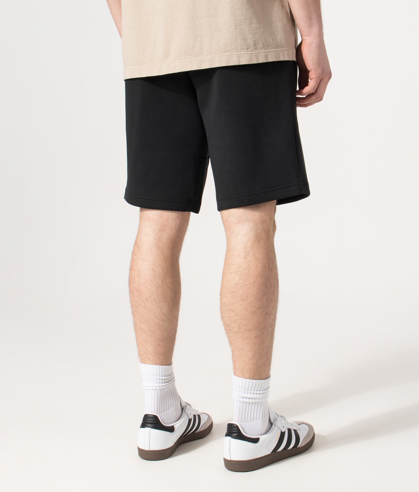 Polo Ralph Lauren Regular Fit Double Knit Athletic Sweat Shorts in Polo Black at EQVVS Menswear. Angled model back shot.
