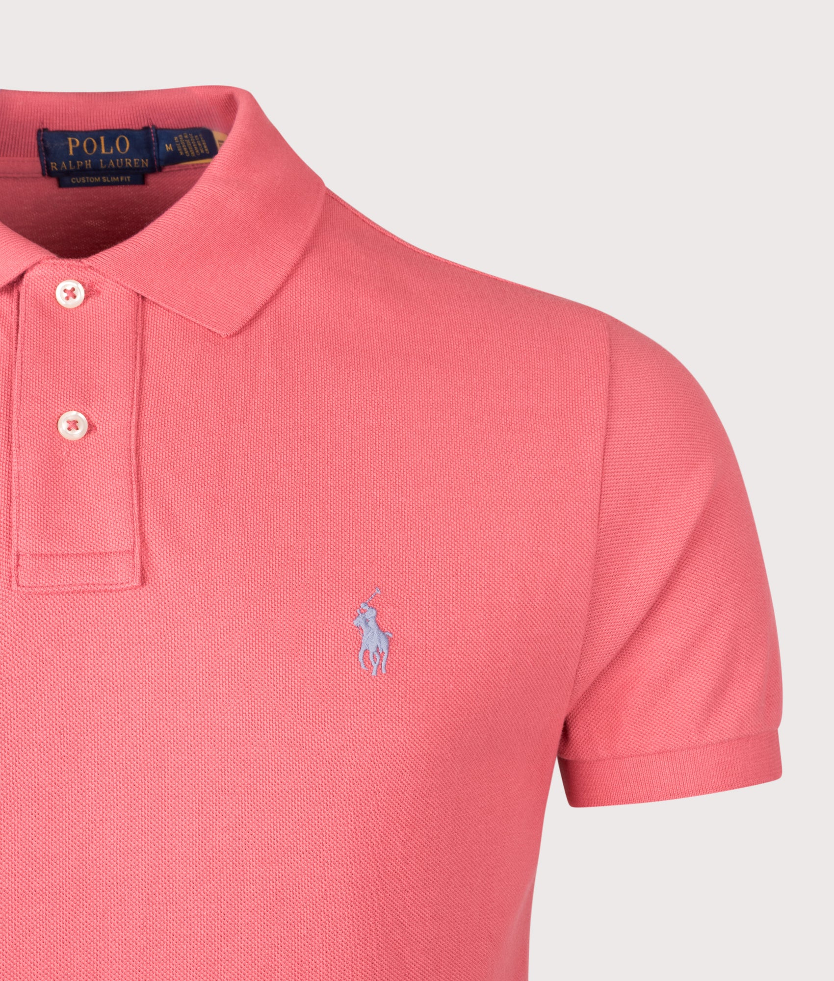 Custom Slim Fit Mesh Polo Shirt in Red Sky by Polo Ralph Lauren. Shot by EQVVS. Detail shot.