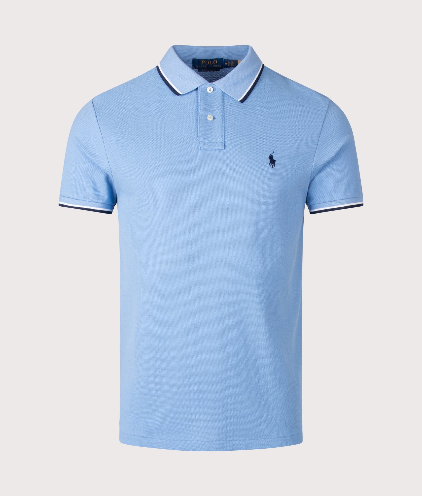 Custom Slim Fit Mesh Polo Shirt in Blue by Polo Ralph Lauren. Shot by EQVVS. Front shot.