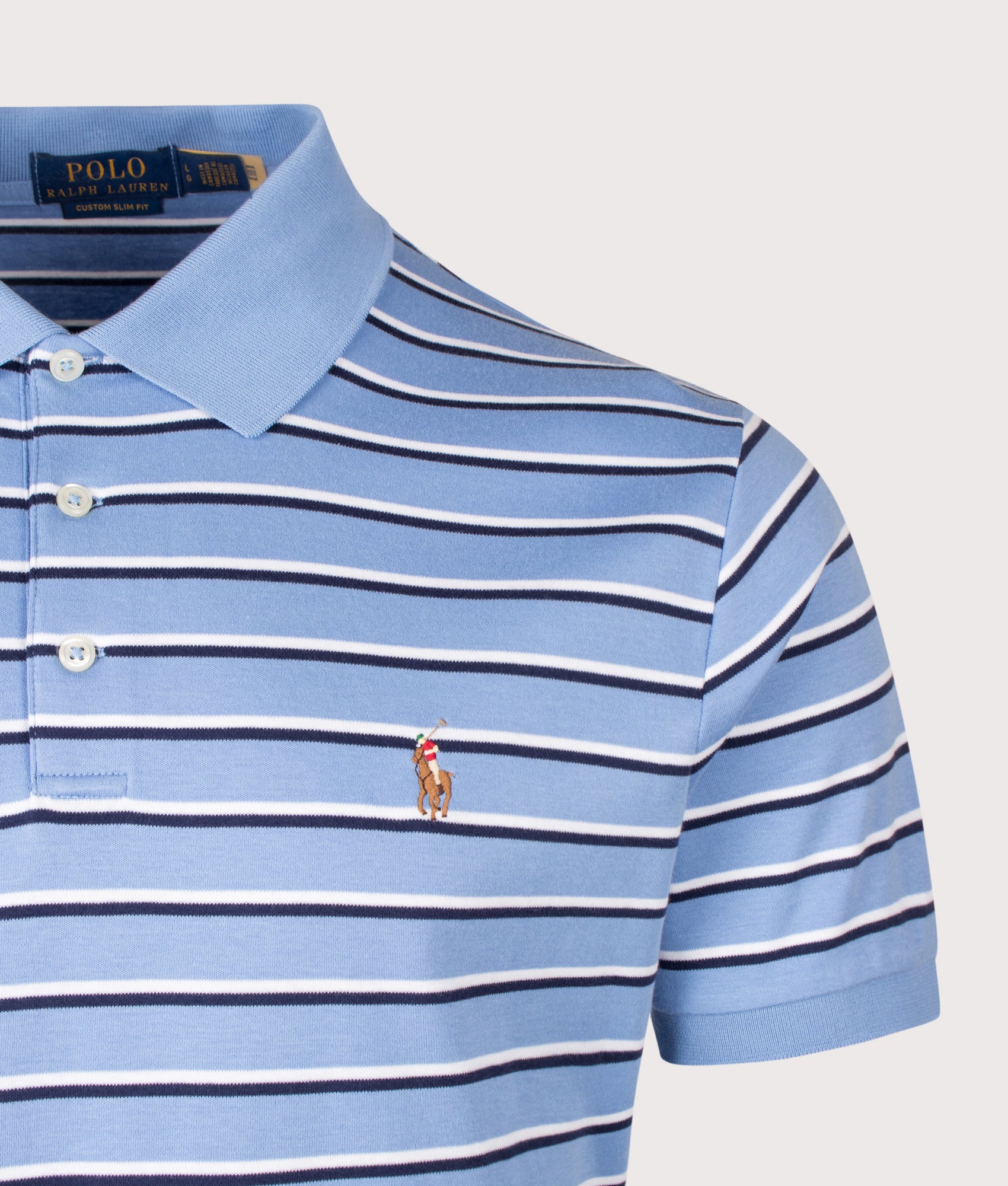 Custom Slim Fit Striped Soft Cotton Polo Shirt in Sky Blue Multi by Polo Ralph Lauren. Shot by EQVVS. Detail shot.