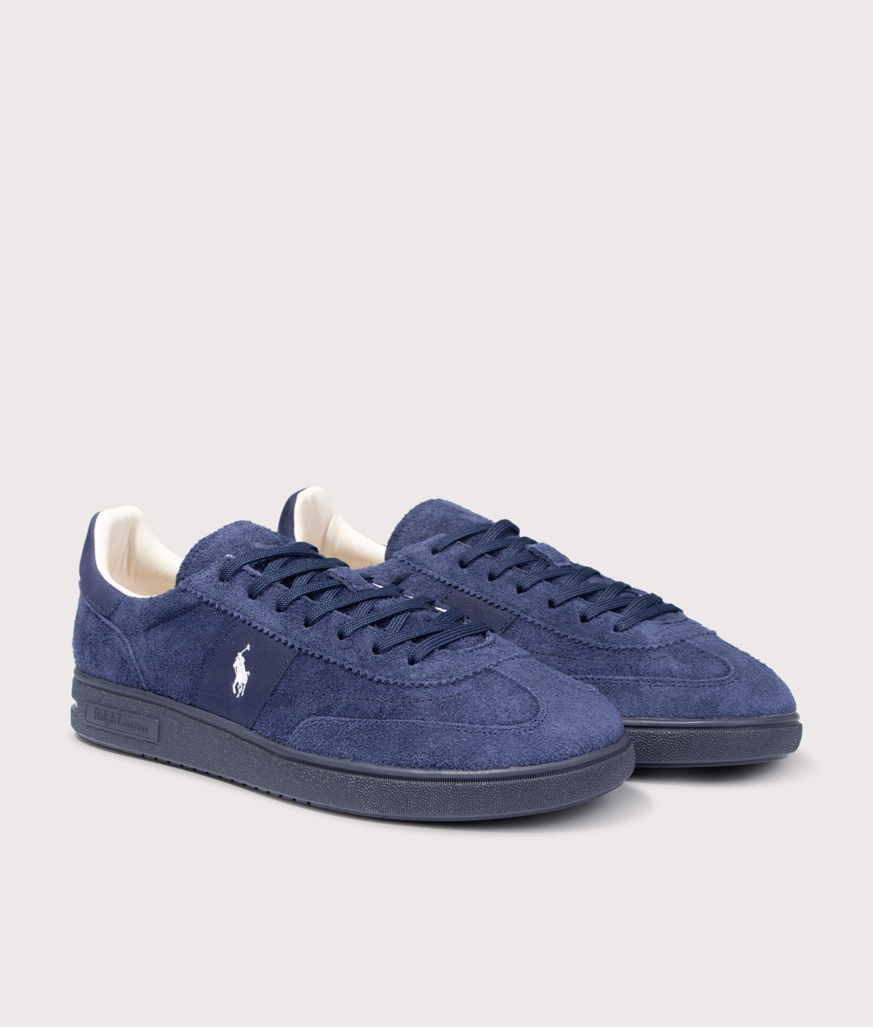 Polo Ralph Lauren Bedford Suede Sneakers in Tonal Navy at EQVVS Menswear. Angled front shot.
