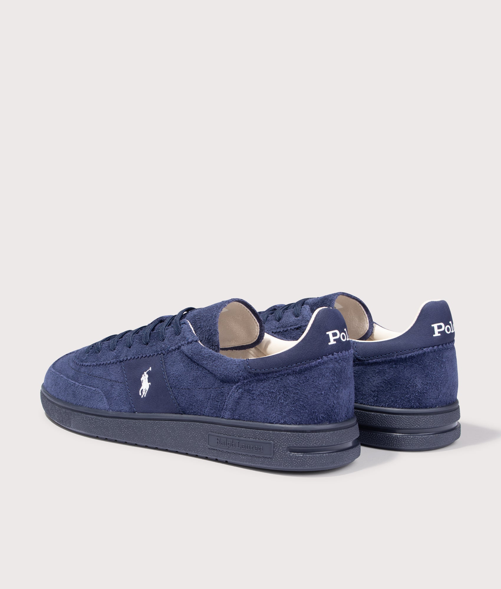 Polo Ralph Lauren Bedford Suede Sneakers in Tonal Navy at EQVVS Menswear. Angled back shot.