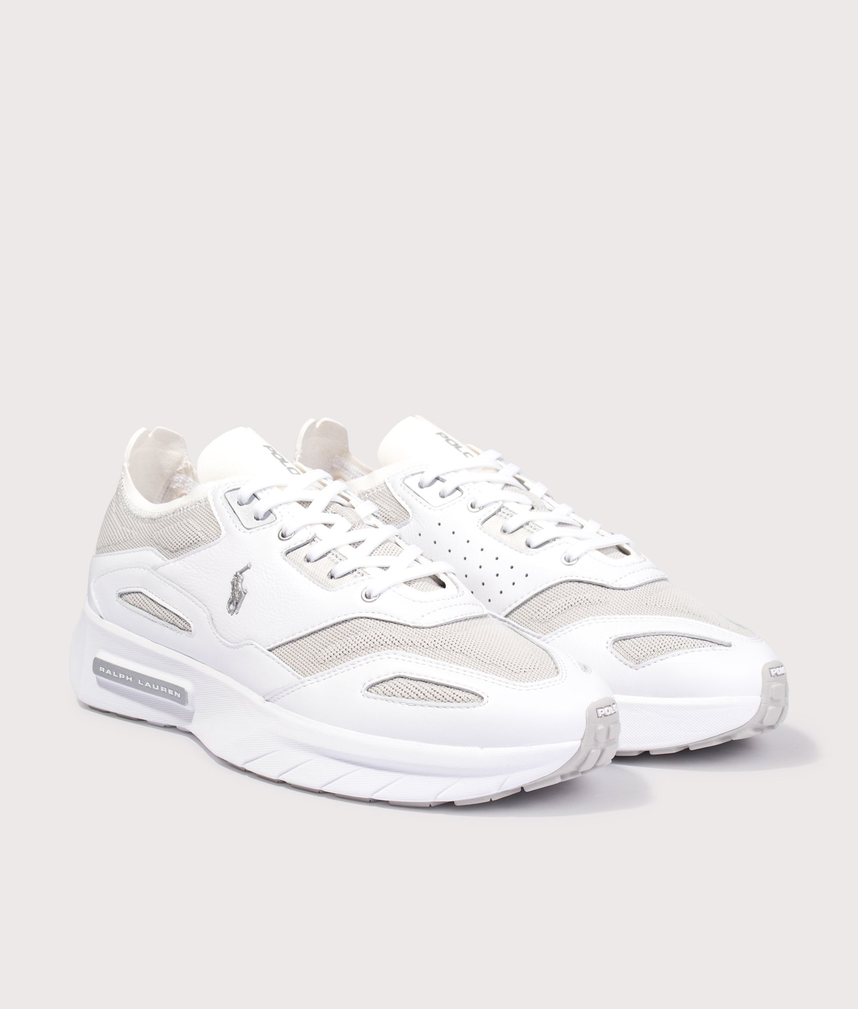 Polo Ralph Lauren Boerum Suede-Paneled Knit Trainers in Deckwash White and Grey Violet at EQVVS Menswear. Angled front shot.