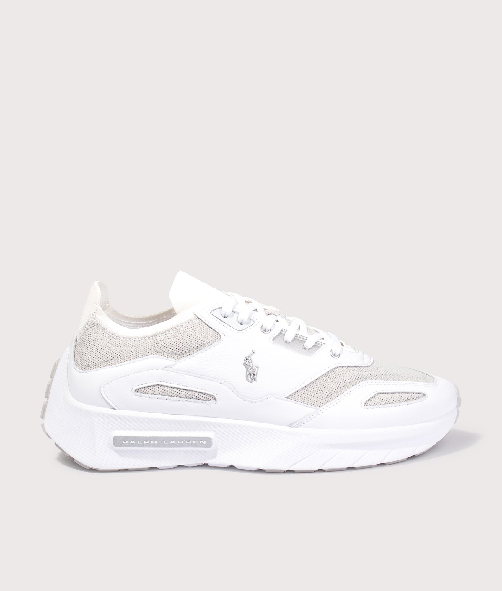 Polo Ralph Lauren Boerum Suede-Paneled Knit Trainers in Deckwash White and Grey Violet at EQVVS Menswear. Side shot.