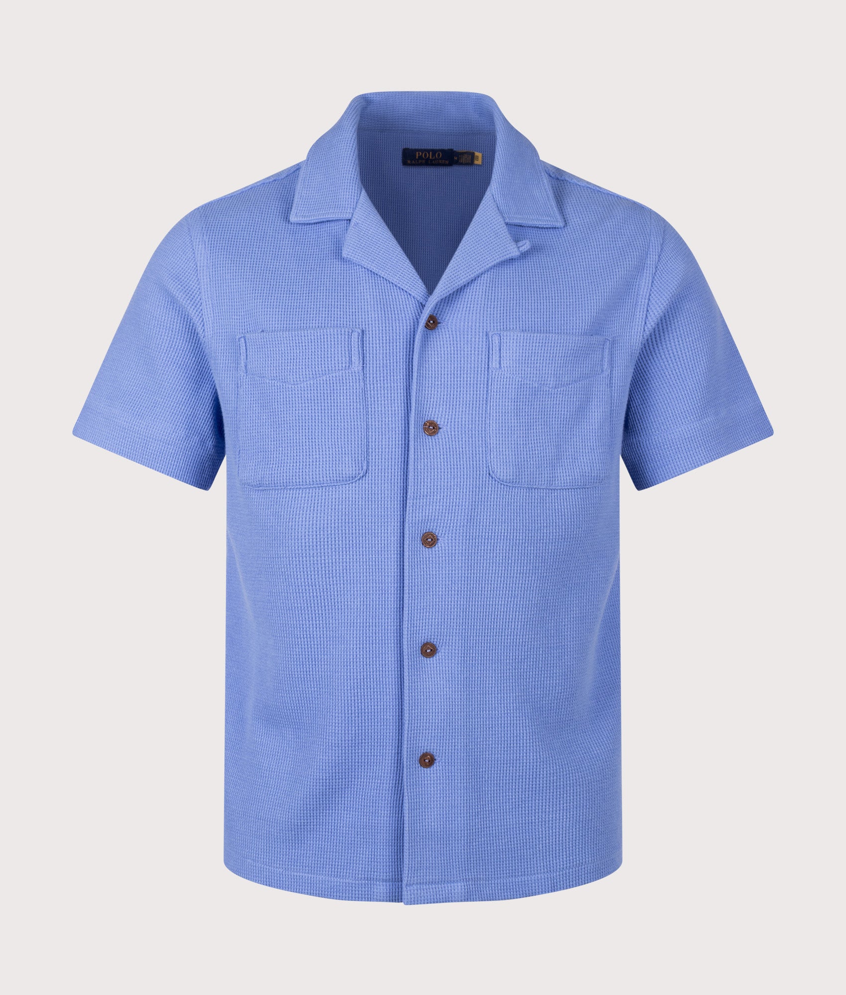 Polo Ralph Lauren Waffle-Knit Cotton-Linen Camp Shirt in Harbor Island Blue at EQVVS Menswear. Front shot.
