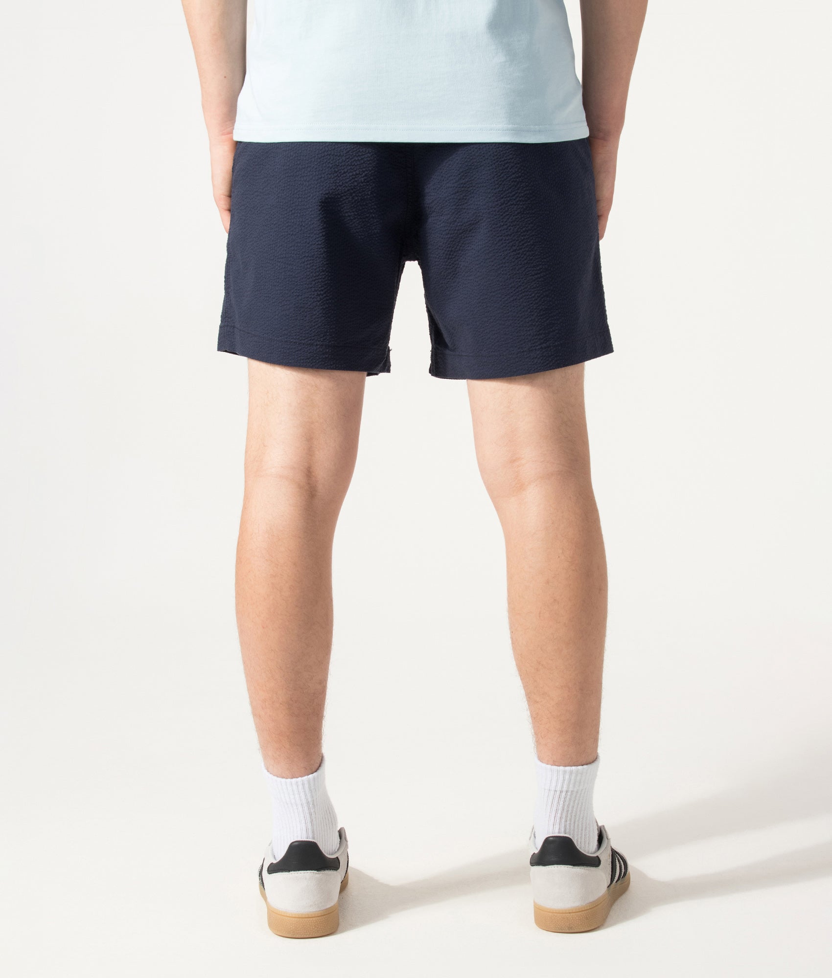 Polo Ralph Lauren Classic Fit Polo Prepster Performance Shorts in Newport Navy and Collection Navy at EQVVS Menswear. Model back shot.