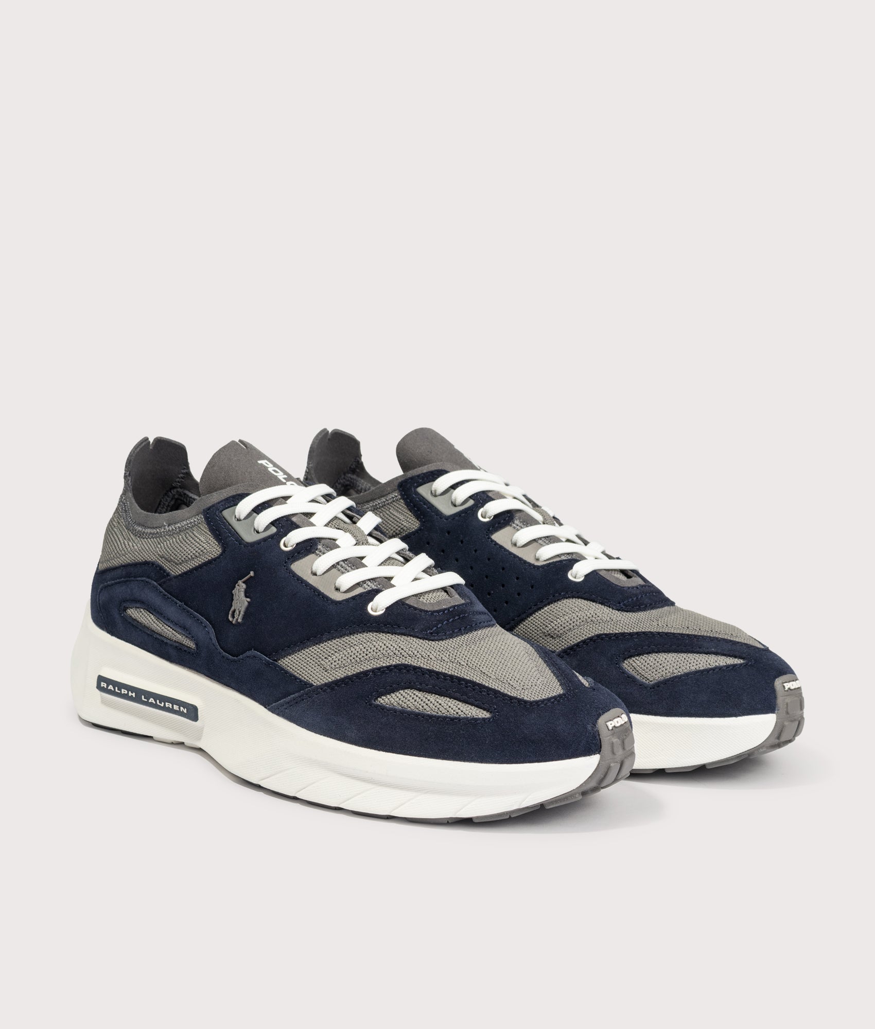 Polo Ralph Lauren Boerum Suede-Paneled Knit Trainers in Hunter Navy and Dark Metal at EQVVS Menswear. Angled front shot.