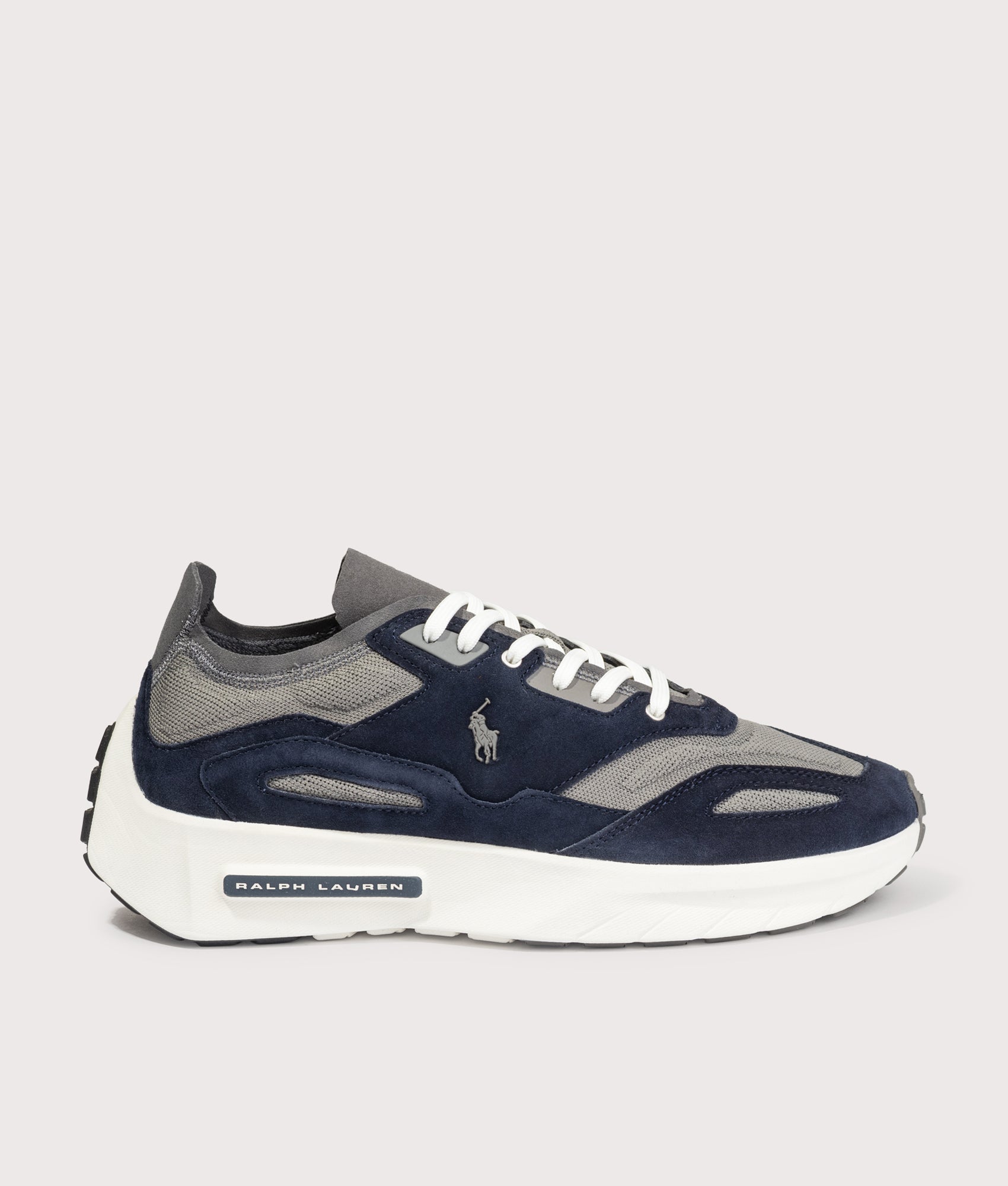 Polo Ralph Lauren Boerum Suede-Paneled Knit Trainers in Hunter Navy and Dark Metal at EQVVS Menswear. Side shot.