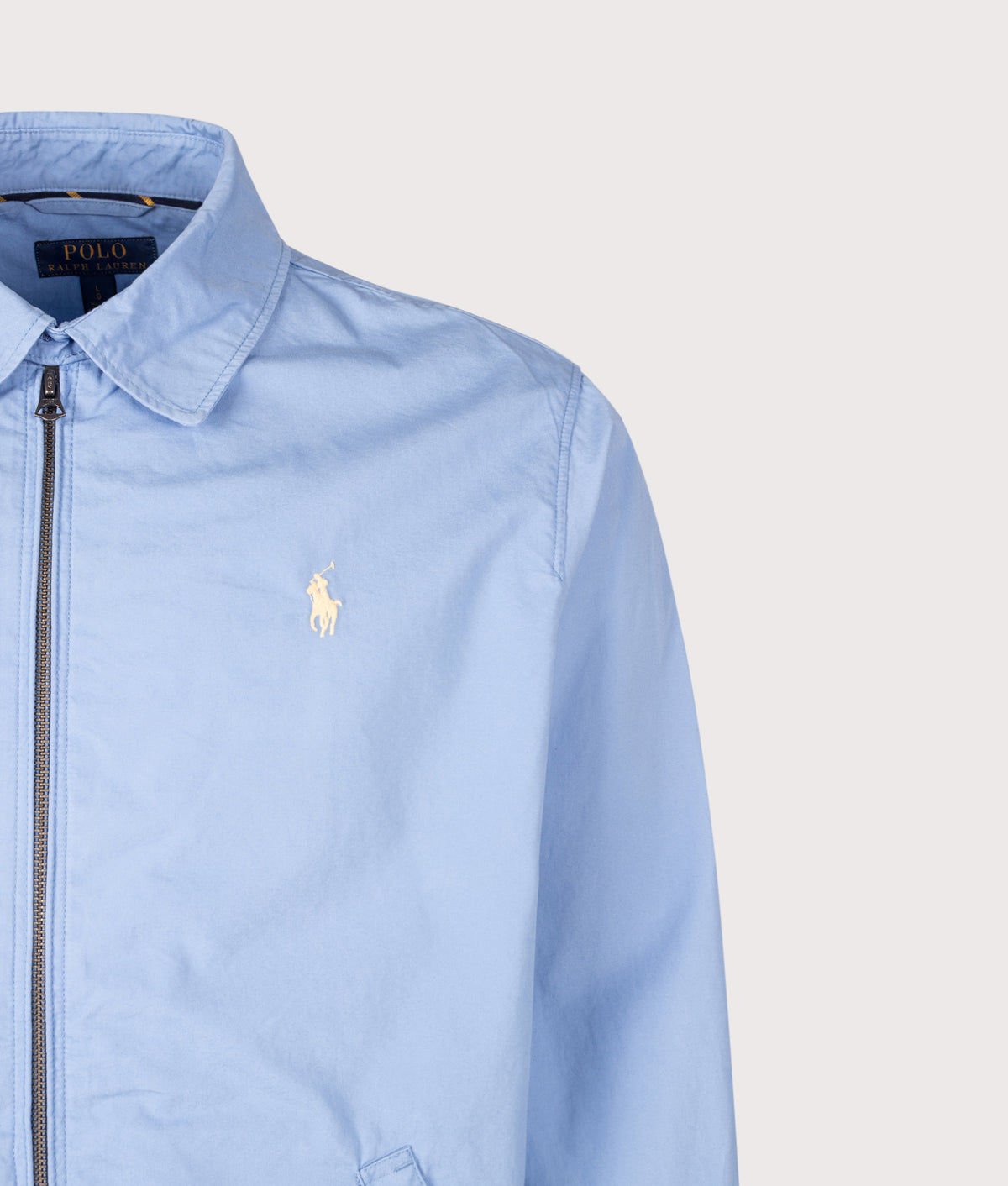 Polo Ralph Lauren Bayport Poplin Windbreaker Jacket in Bristol Blue at EQVVS Menswear. Detail shot.